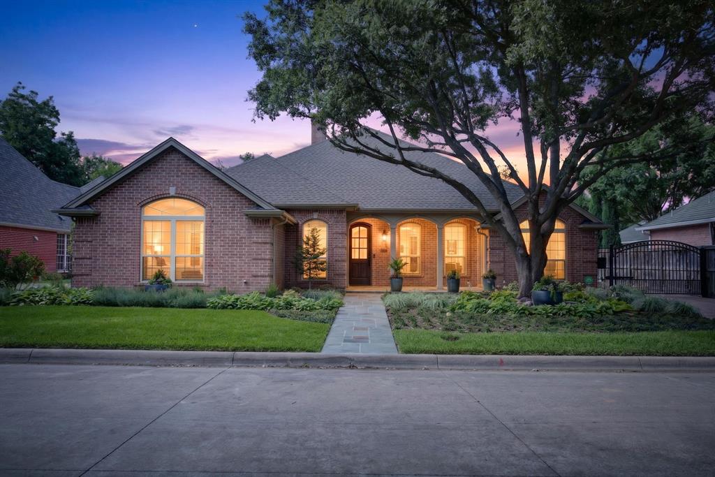 Behind the gates of prestigious Stonegate, one of Fort Worth's premier guard-gated communities, this extensively renovated home offers a rare combination of timeless design and modern luxury. Taken down to the studs and thoughtfully reimagined, the approximately 2,775-square-foot residence features three bedrooms, a private office, two-and-a-half baths, and a gated driveway with a two-car garage.

Light-filled living spaces showcase wide-plank white oak floors, custom architectural details, and refined finishes throughout. The chef's kitchen is equipped with professional-grade Thermador appliances, custom cabinetry, and an open layout ideal for everyday living and entertaining. The private primary suite features a spa-inspired bath with a custom wet room and designer finishes, while a dedicated office with a concealed Murphy bookshelf door provides exceptional flexibility.

Significant upgrades include wood-clad windows, solid-core doors, a Generac whole-house generator, upgraded electrical service with EV charging capability, tankless water heater, reverse osmosis water filtration, Control4 smart home automation with integrated surround sound, and a custom electric driveway gate.

Located within the highly desirable Stonegate community and zoned to Tanglewood Elementary, this move-in-ready home offers exceptional craftsmanship, luxury finishes, and quality rarely found in the neighborhood.