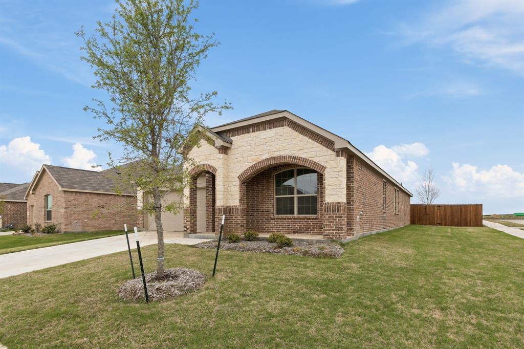 Looking for one of the best values on a brand-new, never-lived-in home in McKinney under $500,000? This is it! Located in highly sought-after McKinney ISD with **NO MUD and NO PID**, this beautiful home offers exceptional value and modern design.

Situated on a desirable corner lot, you'll enjoy added backyard space and extra privacy with no neighboring home on one side. The thoughtfully designed floor plan features all bedrooms on the main level, while a spacious upstairs game room provides the perfect flex space for entertaining, a media room, or a home office.

Inside, luxury vinyl plank flooring flows throughout the main living areas, with carpet in the bedrooms for added comfort. The open-concept layout is ideal for everyday living, and the kitchen is equipped with a gas range and modern finishes. The private primary suite features separate vanities and an oversized walk-in shower.

Built with energy efficiency in mind, this home also includes a tankless water heater to help maximize comfort and efficiency.

Opportunities like this don't come along often. Why wait to build when you can move into a brand-new home today? At this price, this home won't last long—schedule your showing before it's gone!
