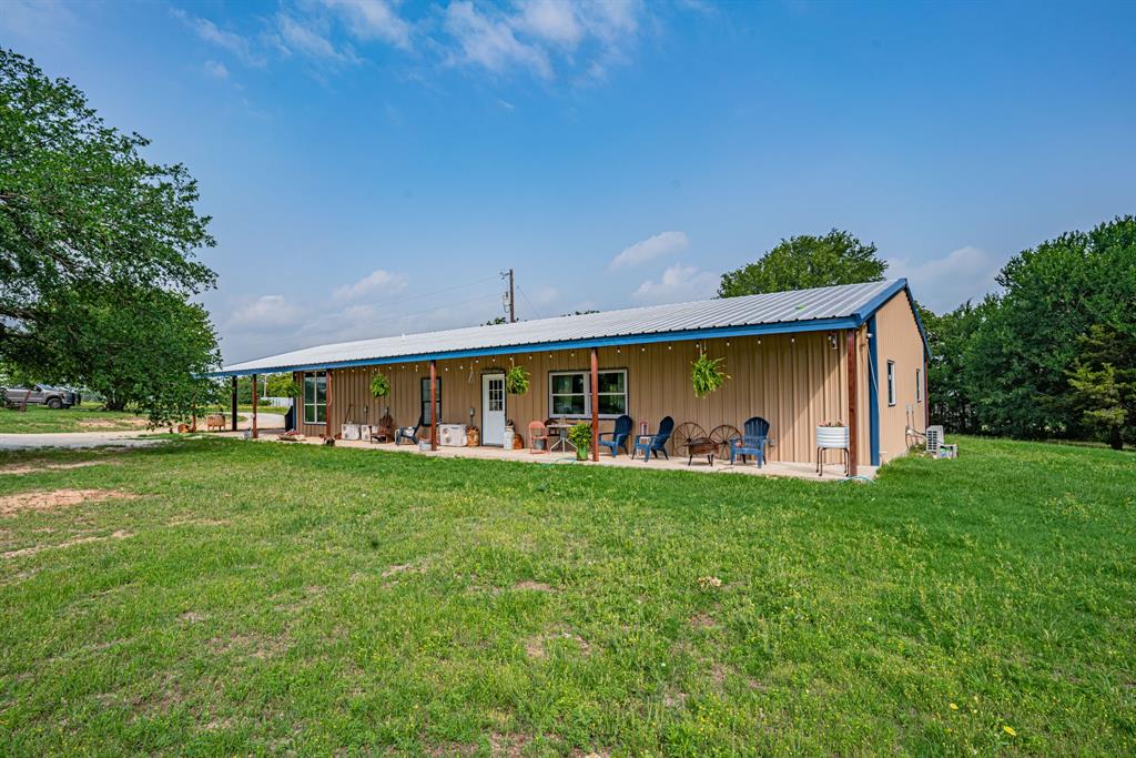 TOLAR SCHOOLS! 5 bedroom, 3 bath, perfect for your family, on 5 beautiful acres with large oak trees. Metal construction, with wrap around porches, large attached carport, spacious open living - kitchen & dining area, with mini split HVAC systems. Great place for horses, with private location.