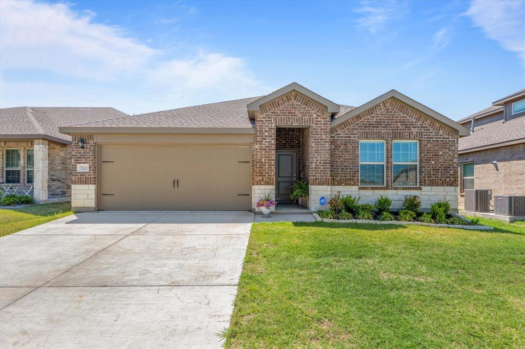 Welcome to modern living in one of North Texas' fastest growing and most desirable areas! Built in 2024, this stunning 4 bedroom, 2 bath home offers the perfect blend of style, comfort and convenience in the thriving McKinney-Melissa community. From the moment you arrive, you will love the eye catching brick and stone elevation that sets the tone for the quality found throughout. Inside, the home features luxury vinyl plank flooring throughout- including upgraded LVP in all bedrooms, providing both durability and a seamless look. Contemporary color palettes and modern finishes create a clean, inviting atmosphere. The kitchen is designed to impress with granite countertops, rich dark wood cabinetry, stainless steel appliances, and a spacious walk-in shower with built in bench, dual sinks and stylish open shelving for added functionality and design. Located in the McKinney-Melissa area, easy access to major highways for commuting to Dallas or other surrounding areas. With rapid growth, new shopping, dining, and entertainment options, this area continues to be a smart choice for homeowners looking for lifestyle and value.