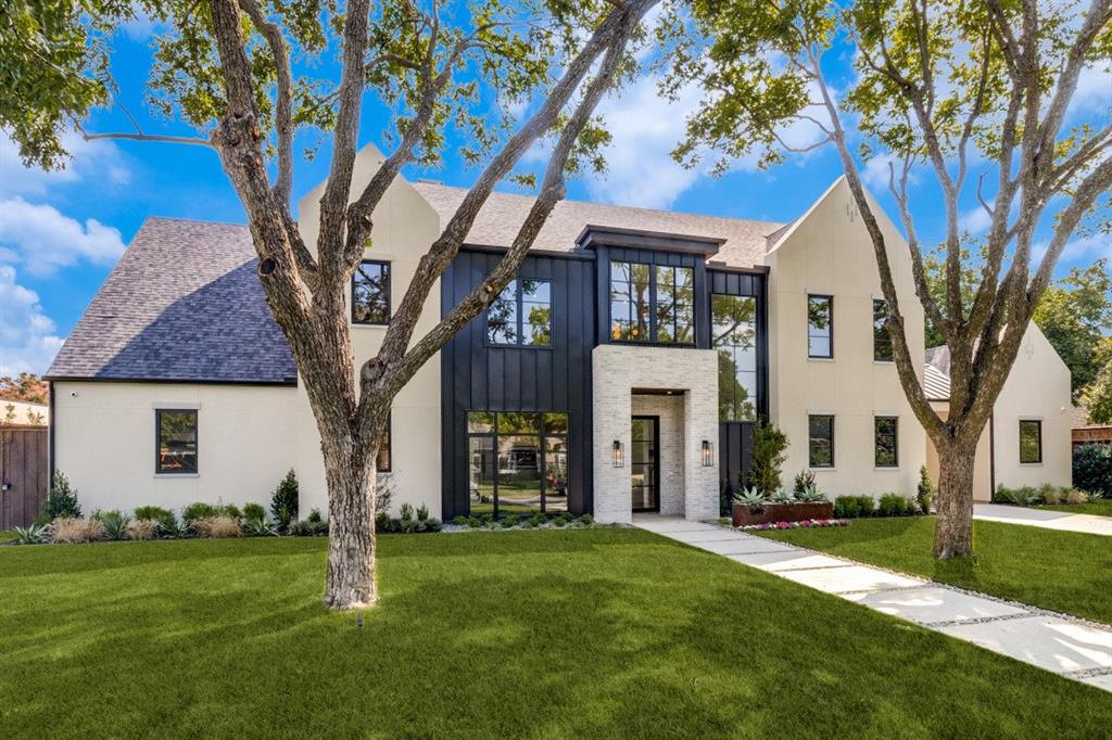 Stunning transitional design located in the heart of Preston Hollow.  This showpiece is an
exemplary example of the finest craftsmanship detail you have come to expect from the
partnership of On Point Design and Bond+Truss Luxury Homes. Striking Stucco exterior with
custom finish, tongue groove cedar soffits, stunning standing seam metal accents panels
completed by commercial grade store-front windows. Inside take notice to 11-foot ceilings, floor
to ceiling windows, wide plank white oak hardwood floors. Elevated sophisticated finishes
with no expense spared. Beautiful high-end light fixtures from top designers including Aerin,
Kelly Wearstler, RH and Ralph Lauren. Breathtaking kitchen with robust Sub Zero Wolf
appliance package including 2 dishwashers + incredible secondary prep kitchen, walk-in pantry
area. Amazing living room space with soaring 14’ ceilings and Isokern masonry fireplace that
connects seamlessly to the dining room with walk-in, temperature-controlled wine room. 
Oversized covered outdoor living area connects via large bi-parting glass slider with second
Isokern masonry fireplace, top-of-the-line Coyote grill and vaulted ceilings! Large backyard
perfect for a playground, pool or any new owner’s dream. Four secondary bathrooms all include
ensuite full bathrooms. Enormous upstairs playroom with exceptional glazing providing natural
lighting flanked by extra flex room perfect for a gym, second office or theater room. Both
upstairs and downstairs utility rooms and powder rooms make for the perfect living and
entertaining convenience. Schedule your private showing today and come see for yourself!