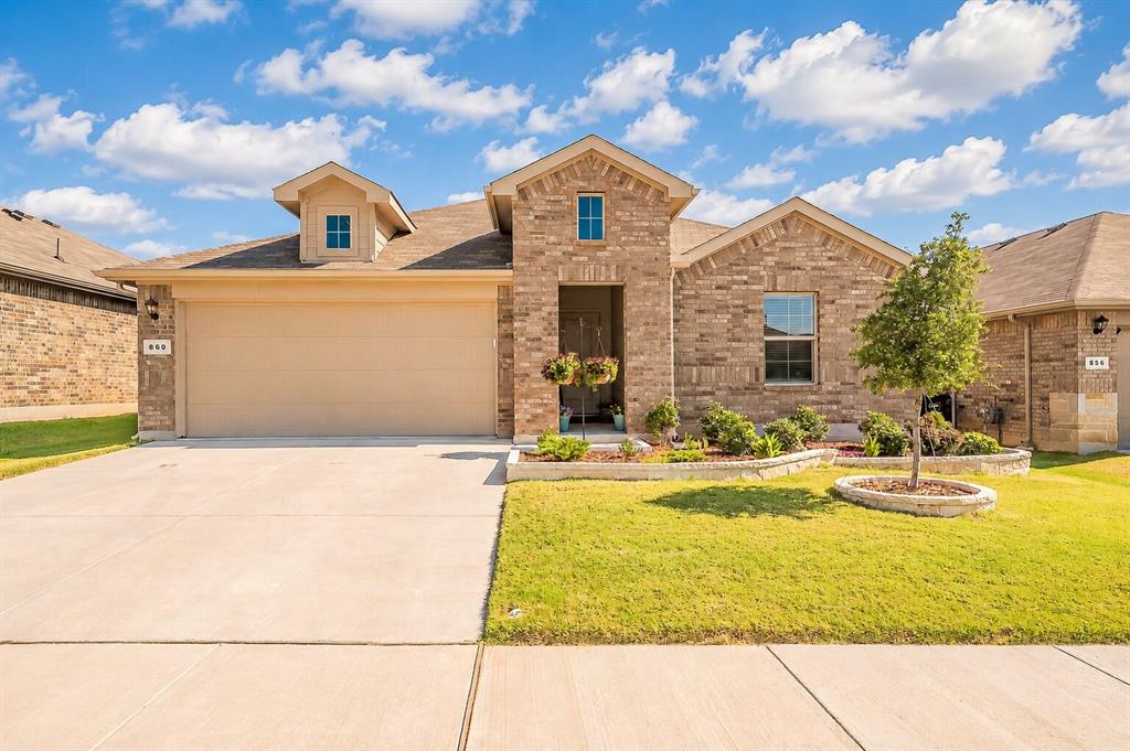 WELCOME HOME! Better than new, this beautifully upgraded D.R. Horton home offers modern style, thoughtful updates, and peaceful views with no rear neighbors. Backing to open farmland with grazing livestock, you'll enjoy rare privacy and tranquil Texas sunsets from the oversized covered patio. Inside, the open-concept floor plan seamlessly connects the kitchen, dining, and living areas, creating the perfect space for everyday living and entertaining. The home has been tastefully enhanced with fresh interior paint, luxury vinyl tile flooring throughout the main living areas, a custom living room accent wall, professionally landscaped flower beds, and new gutters. The spacious kitchen features Whirlpool stainless steel appliances, while the built-in smart home system allows convenient remote control of security, lighting, and temperature. Located in a well-maintained community with a neighborhood pool, playground, dog park, walking trails, and green spaces, this home also offers quick access to Eagle Mountain Lake, Alliance Town Center, and the Fort Worth Stockyards. Plus, enjoy added peace of mind with remaining D.R. Horton builder warranties, including major mechanical coverage through 2027 and structural coverage through 2035. This move-in ready home combines modern comfort, scenic surroundings, and an unbeatable location.