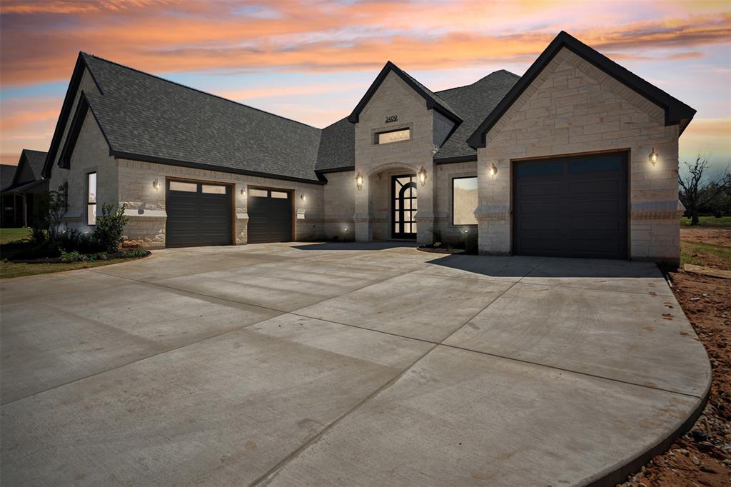 Home exudes luxury with one of a kind Iron Door, gold fixtures, glass door hardware, Delta faucets  and built in cabinetry for automatic floor vacuums Open concept feel with 18ft of glass opening to large patio and 72in linear fireplace.  Theater Room with 120 inch screen, surround sound in theater room and great room.  House comes with TVs mounted in each bedroom , great room and game room.  Unique bunk room with 4 built in twin bunkbeds for large house gatherings.  Large Master Suite with 60in electric fireplace. Master Suite Master Bath has a surround soak tub, Toto Toilet seat, towel warming bar, shower heater and his and her vanities.  Master Closet to die for with his and her dressing storage as well as built in light mirror salon area. One bedroom has separate garage and ensuite. Kitchen houses GE Monogram appliances and a unique 57in workstation as well as workstation accessories. Very unique granite. Study with 2 built in desks. 2 separate mud benches and enormous pantry.