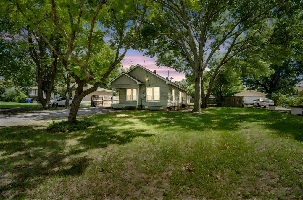 This charming 2 bedroom, 1 bath wooden home in Hillsboro sits on 0.2 acres and offers a cozy, character-filled living space at 922 square feet. Built in 1940, this home features laminate flooring throughout and a fully fenced backyard perfect for pets or outdoor enjoyment. A 2 car carport with additional storage adds everyday convenience. Whether you are looking for a starter home, downsizing, or adding to your investment portfolio, this charming property is full of potential and ready for its next chapter.