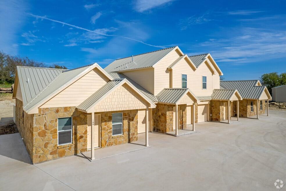 Charming 3 bed, 2 bath townhome for lease. Enjoy the privacy of a private backyard and the convenience of a one-story layout. Built in 2022, this modern home features granite countertops and hardwood flooring throughout. The complex consists of 3 buildings with 4 units each, offering a cozy community feel. Additional amenities include an attached 1-car garage, walk-in closet in the master bedroom, covered parking for a 2nd car, and an in unit laundry room with full-size washer and dryer hookups. Refrigerator included! Trash, water, and sewer included. Brock ISD. Located just past the Canyon West Golf Course with hilltop views.

$50 monthly covered parking fee
