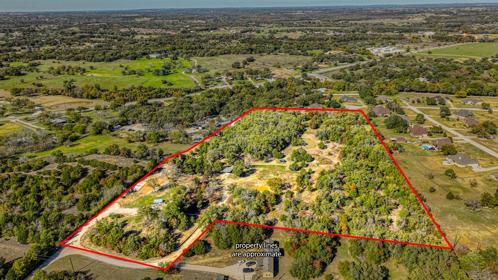 Welcome to this absolutely stunning 12.63-acre property just outside Weatherford City limits. Located off the new Ric Williamson loop, this place offers a perfect combination of serenity, convenience and potential. This breathtaking land offers views for miles and diverse building opportunities and potential uses. Nestled at the end of the Marilyn St, this expansive parcel boasts multiple building sites for creating your dream home or a private retreat. Imagine the possibilities amidst rolling hills and captivating vistas. An exceptional canvas for your vision, this scenic property features an existing water well, power to two sites of the property, a private pond-tank, multiple building sites but also many trees and untouched nature for privacy. This is a unique opportunity to own a beautiful piece of desirable Weatherford TX.