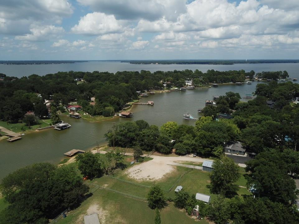 Build Your Dream Lake Retreat at Cedar Creek Lake! This prime homesite is ideally located just one block from boat ramp access, fishing, and the beautiful waters of Cedar Creek Lake. Enjoy water views just a short stroll from the property and experience the perfect blend of lake living and convenience. A newly constructed luxury home next door adds to the appeal and value of the area. Situated in a clean, well-maintained neighborhood, you'll also appreciate nearby shopping, dining, and everyday conveniences. Best of all, Downtown Dallas is less than an hour away, making this an excellent location for a full-time residence, weekend getaway, or investment property. Don't miss this opportunity to own a piece of lake-country living with easy access to recreation, relaxation, and city amenities.