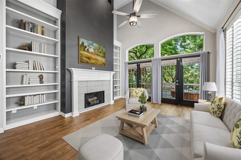 Tucked away on a quiet, tree-lined cul-de-sac, this rare retreat provides a tranquil setting surrounded by mature trees while remaining just minutes from everything Dallas has to offer. Thoughtfully designed with an open-concept floor plan, soaring vaulted ceilings, expansive skylights, and walls of windows, the home is filled with natural light and showcases picturesque views of the private backyard and inviting outdoor living spaces. The chef-inspired kitchen is the heart of the home, featuring a large center island, walk-in pantry, built-in stainless-steel appliances, abundant cabinetry, and seamless flow into the spacious living room. Anchored by a cozy wood-burning fireplace, the living area also offers vaulted ceilings, transom windows, custom built-in shelving, and effortless access to the outdoor entertaining areas. The generous primary suite is a relaxing sanctuary with private patio access, built-in shelving, and a beautifully appointed ensuite bath complete with dual vanities, a spacious step-in shower, and an oversized triple-hung walk-in closet. Upstairs, a bright and versatile gameroom with dual skylights and stylish barn doors serves as the perfect flex space while providing access to the two secondary bedrooms and a full hall bath. Step outside to experience a backyard that truly feels like a private treehouse retreat. The expansive deck features a covered pergola with a ceiling fan and charming market lights, while the adjacent open patio offers the ideal setting for al fresco dining, morning coffee, or evening gatherings beneath a lush canopy of mature trees. Ideally situated in the heart of Lake Highlands, this beautifully updated home offers the perfect balance of peaceful living and exceptional convenience, with quick access to White Rock Lake, NorthPark Center, Downtown Dallas, Love Field, DFW International Airport, premier dining, shopping, and major commuter routes.