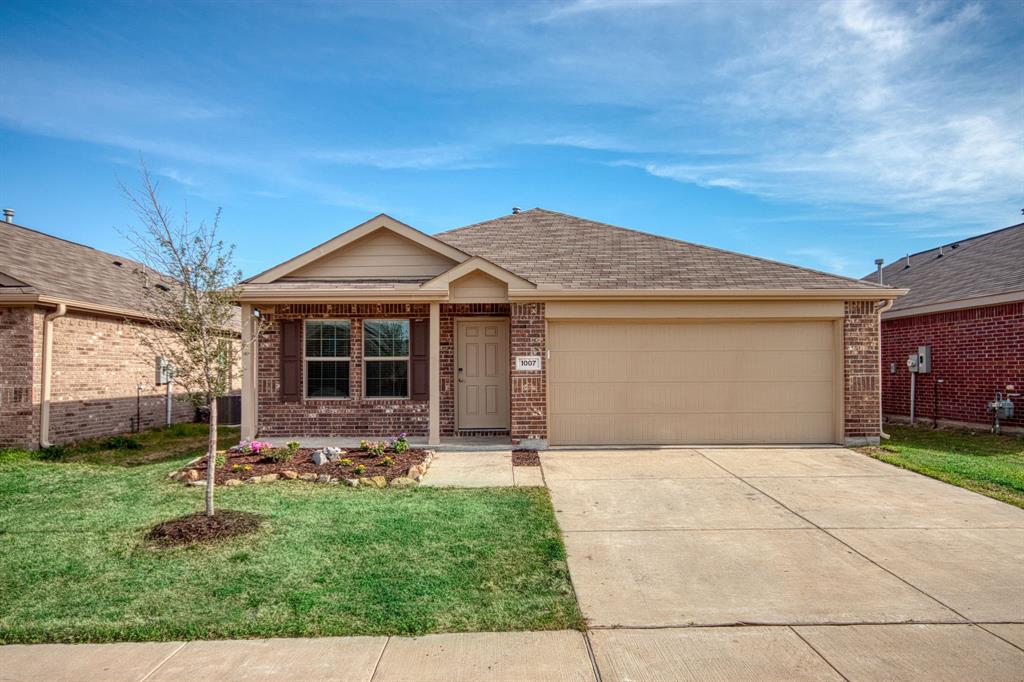 Welcome to this beautifully maintained 3-bedroom, 2-bath home built in 2021 located in Bluebonnet Estates Phase 1 in Ennis. This charming single-story home offers an open-concept layout filled with natural light, seamlessly connecting the living, dining, and kitchen areas—perfect for everyday living and entertaining. The spacious primary suite features a private bath and generous closet space, while two additional bedrooms provide flexibility for guests, a home office, or family. Situated on a 0.1188-acre lot, the home also includes a two-car garage and private backyard with room to relax or entertain. Conveniently located near downtown Ennis, shopping, dining, and quick access to I-45 for an easy commute to Dallas