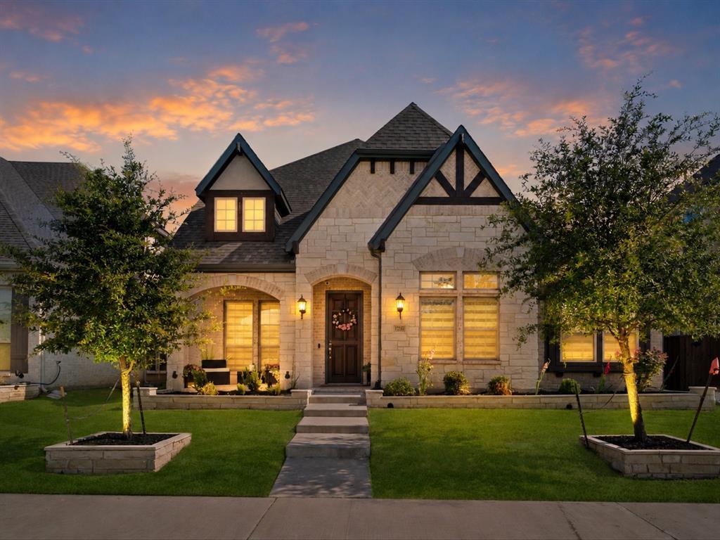 This impressive north-facing First Texas home seamlessly blends stately elegance with picturesque charm, featuring an oversized front porch and beautiful raised stone landscaping pavers—the perfect place to enjoy your morning coffee or unwind in the evenings. On the main level of this premium home you'll find the primary suite, a separate private guest bedroom, dedicated home office, + 2.5 baths, a functional and highly sought after floorplan! The expansive designer dream kitchen is perfect for entertaining, showcasing upgraded quartz countertops, a huge center island, sleek stainless steel Electrolux appliances, 5-burner gas cooktop, deep stainless steel sink, and extensive custom cabinetry and counter space for unbeatable storage and organization. Elegant and desirable zebra window shades enhance this home inside and out. The open-concept design seamlessly connects to the elegantly designed living room with soaring ceilings that enhances this homes grand feel. The primary suite offers a peaceful escape with an elegant well appointed en-suite bath featuring, dual vanities, oversized walk-in shower, designer tile, and gorgeous stand alone cabinet framed soaking tub. Ascending to the second level, the thoughtfully designed layout continues with two bedrooms, a versatile game-room plus an impressive cinematic media room perfect for an elevated entertainment experience at home. additional upgrades include, motorized backyard gate, landscaping pavers, upgraded flooring, whole house water softener + reverse osmosis, and so much more! Located in the highly sought-after Mercer Crossing master-planned community, residents enjoy an amenity center, multiple pools, a fitness center, dog parks, playgrounds, lakes, and extensive walking trails. The location is unbeatable—offering easy access to 635, 35, the George Bush Turnpike, both airports, and countless shopping and dining options. An opportunity that wont remain on the market unnoticed!