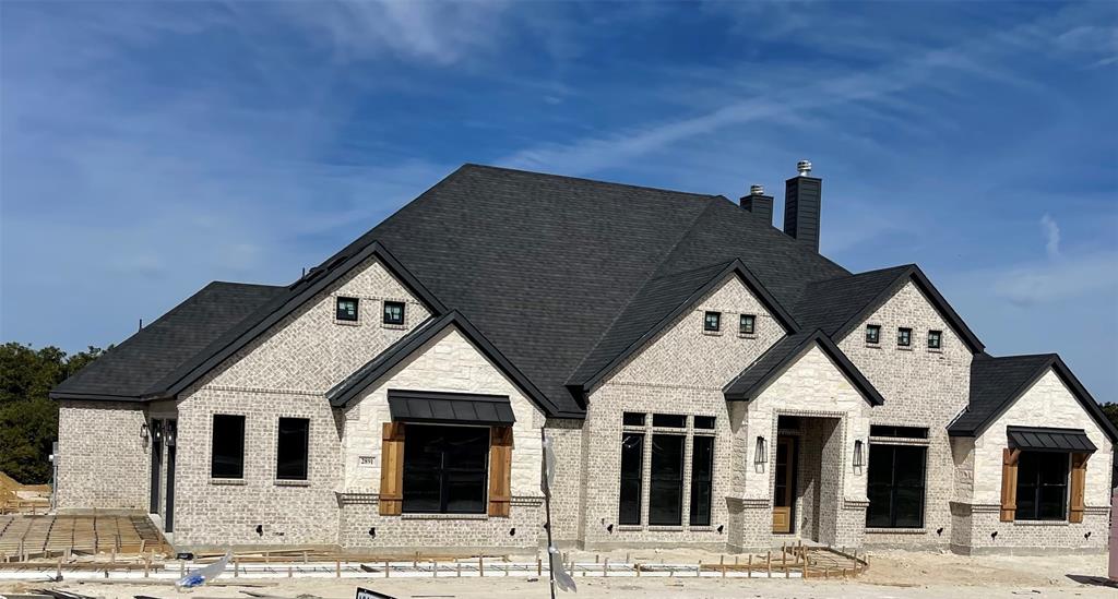 Crafted with perfection, this custom brand new 4 bedrooom, 3 bathroom home boasts 3269 sf of elegance. Modern amenities, top tier finishes, and a 3 car garage meet on a spacious 1 acre corner lot. Your dream home awaits in Midlothian ISD. Bask in the warmth of wood floors as you embrace the open concept living in this thoughtfully designed haven. Indulge in luxury in the expansive primary bedroom, complemented by a spa like lavish en suite bath for your utmost comfort and relaxation. Elevate your entertaining in the gameroom where a convenient wet bar and built in wine rack await, adding flair to every gathering. Each of the 3 additional bedrooms offer spacious retreats, complete with walk in closets for both style and functionality. Experience outdoor bliss with a covered patio and a cozy fireplace, creating the perfect ambiance for al fresco living in every season. Nested in a prime location this gem offers convenience and accessibility. Go See NOW!