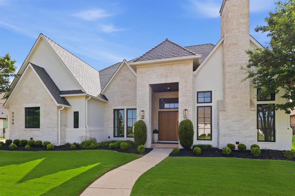 Welcome home to 4500 Saddlewood Dr. This 1 STORY HOME, Built in 2016 & meticulously redesigned in 2024 by Providential Custom Homes boasts 4,900 sqft, half acre lot with a 4-car garage offering  everything a discerning buyer is looking for. A fresh façade with Andersen windows, crowned by a DaVinci roof, sets the tone before you even step inside. A 6-ft wide steel-core custom pivot door opens to reveal an ultra-smooth Level 5 drywall finish throughout the entire home, with nailed-down red oak flooring in a custom white stain. The herringbone entry leads to a stately front office with black steel & glass doors, cast stone fireplace with fluted wood detailing to the ceiling, built-in credenza & floating shelves. The spacious living room with a second cast stone fluted fireplace is perfectly balanced by floating credenzas and matching shelves, while Restoration Hardware light fixtures elevate every room. The kitchen makes an unforgettable statement with premium rift cut white oak cabinets and sealed Bianca Rhino marble countertops, fully equipped with commercial-grade Thermador appliances: separate 36-in refrigerator & freezer, built-in coffee maker, 6-burner range with griddle, 2 dishwashers & microwave drawer. At the back of the home, a game-media room serves as the perfect hub for movie nights with custom built-in cabinets, dedicated back-wall TV setup and automated shades. Three large secondary bedrooms, split from the primary, all include ensuite baths, marble tile floors & Restoration Hardware fixtures and mirrors. The primary suite is a true sanctuary: matte black concrete soaking tub, sleek 2 cm quartz shower surround, luxury Brizo plumbing fixtures & intricate decorative marble tile floors, complemented by a boutique-style walk-in closet with deep built-in white oak cabinetry. Outside, the covered patio with outdoor kitchen makes entertaining effortless with a built-in gas grill, flat top and pizza oven. Whole-house generator & water filtration system a plus!