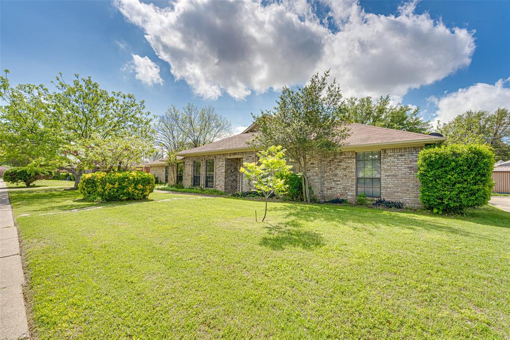 Wonderful home in an established neighborhood! Walk into the large entry that opens up to the Huge Living room with wood burning fireplace. Kitchen has updated appliances including awesome gas cooktop and double ovens! Primary bedroom has a large walk-in closet and updated on suite bath. Split bedrooms. Bedroom 2 and 3 with wood type floors and ceiling fans. Garage has been converted into a 2nd primary with separate entrance. This room would make an awesome guest room, game room, hobby room, etc. This home also has some awesome exterior features! Front driveway that goes all the way through to back ally. Fantastic wood pergola, large shop, + extra storage building and more. This home is a must see!