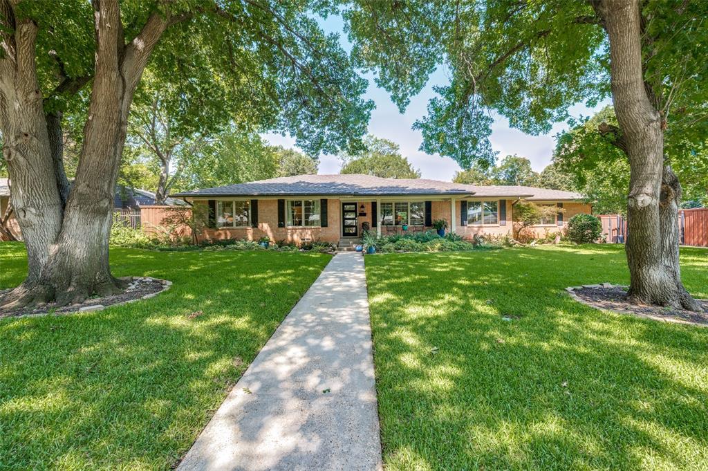 Beautifully maintained and updated home in prime location near ESD and other private schools. This pristine home is move in ready with wood floors, replaced windows and doors throughout, open floorplan with two living areas and three bedrooms. Lots of addition opportunities here as the lot is good sized with a large backyard area. Gorgeous landscaped lot with mature trees. This one is a winner!