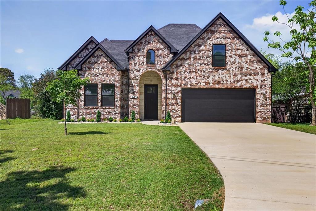 Welcome home to your stunning 3-bedroom, 2-bathroom lakeside retreat located in the heart of East Texas on Cedar Creek Lake. With 50' of  waterfront and wide open water within view, this home was made for entertaining. Step inside to a grand living room boasting 17-foot cathedral ceilings, accentuating the open floor plan. The  spacious kitchen is a chef's dream, featuring a huge island with bar seating, stainless steel appliances, and granite countertops. All bedrooms are conveniently located downstairs, offering comfort and ease of access. The primary bathroom offers a spa-like retreat with a sleek, modern design and elevated finishes throughout. Enjoy a large walk-in shower with frameless glass, designer tile surround, and matte black fixtures for a clean, contemporary look. The dual-sink vanity features striking granite countertops, ample storage, and a dedicated seated makeup area. High ceilings and abundant natural light enhance the open, airy feel, while thoughtful details create both comfort and functionality. Upstairs, discover over 400 square feet of bonus space, ideal for a play area, office, media room, or bunk room providing flexibility for a variety of needs. Tons of storage space. The steel retaining wall is less than two years old and the channel was dredged to approximately 8' also within the past few year. Bring your plans for your boathouse and party dock. (Allowed with Tarrant Regional Water District permit.) Experience the dream of Lakeside Living today.