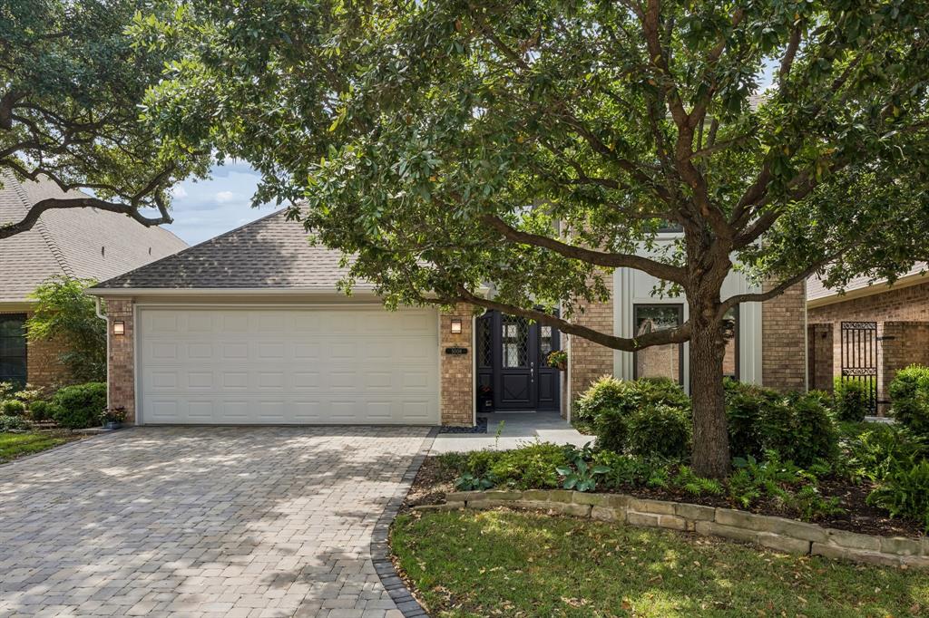 Completely remodeled & updated custom home in coveted Bent Tree Village, steps from Bent Tree Country Club & minutes from the Dallas North Tollway & Preston. This property delivers the rare combination of privacy, low-maintenance living, & peaceful neighborhood lifestyle in one of North Dallas's most sought-after neighborhoods in zip code 75248.
A freshly installed stone paver driveway sets the tone as you arrive, adding to the polished curb appeal of this beautifully maintained home. Natural light pours through walls of windows, illuminating hardwood floors throughout. Every bathroom & the kitchen have been thoughtfully renovated with quality finishes. The chef's kitchen features sleek cabinetry, Bosch stainless steel appliances which include: dishwasher, oven, microwave-convection combo, and an induction cooktop.
Two versatile living areas overlook a private courtyard, giving you the flexibility to use one as a formal dining room. One living space showcases soaring ceilings & a fireplace. The other offers built-in's & direct courtyard access.
The private courtyard is a true retreat, professionally designed by Bonick Landscaping. Unique architectural details include trellis panels salvaged from an 1800s bank elevator cage. The backyard features a working herb garden and zinnia cutting garden. Backyard gate leads to green space & walking path along the edge of the golf course. There are HOA maintained green spaces in the neighborhood.
The primary suite includes a fireplace and a sitting area overlooking the courtyard, ideal for quiet mornings and winding down. The completely renovated primary bathroom features a garden tub, separate shower, dual vanities & double closets. Two additional bedrooms each have their own ensuite bathrooms, one on the first level & one on the second.
Turnkey, tasteful & move-in ready. This is Bent Tree Village living at its finest. All information deemed reliable but Buyer or Buyer's Broker to verify all information and measurements.