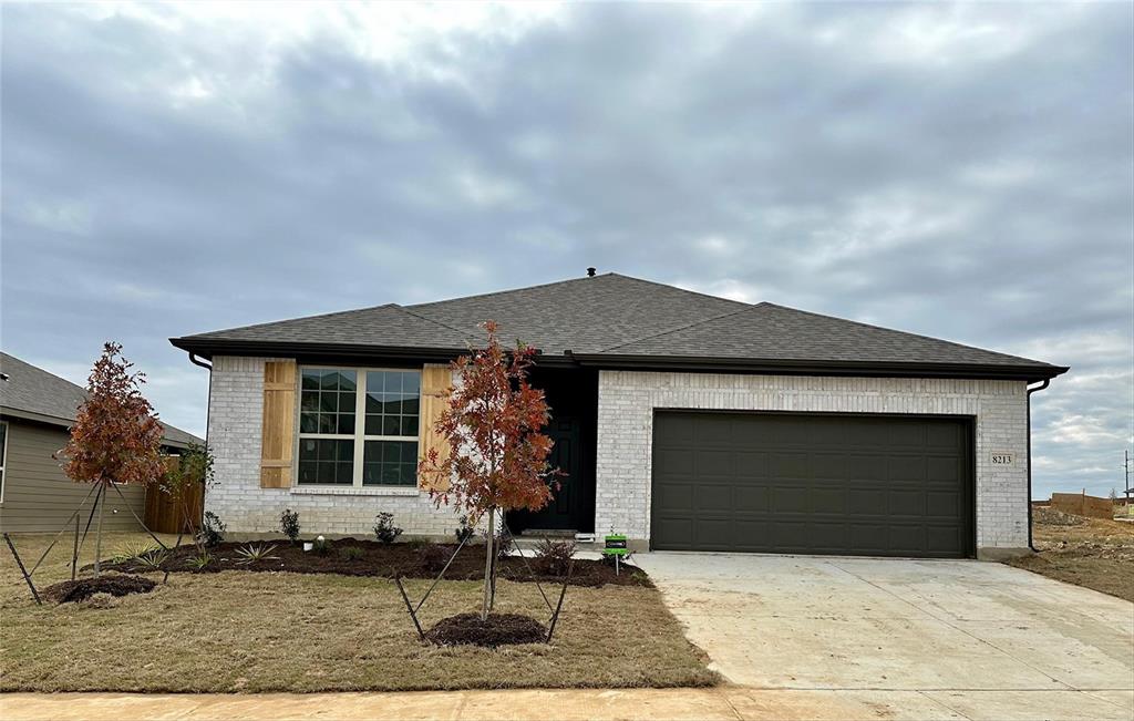 MLS# 20488360 - Built by HistoryMaker Homes - Ready Now! ~ Home for the Holidays! Get ready to be swept off your feet the moment you step into this stunning 4-bedroom home! It's the kind of place that makes you feel right at home from the get-go. This open-concept kitchen is practically a chef's dream come true! Its beautiful white cabinets, wood-look tile flooring, granite countertops, built-in stainless steel appliances, & large central island give any home chef a deluxe workspace. With its direct access to the covered rear-covered patio, this highly functional breakfast nook completes the perfect entertaining area. The primary bdrm is in the rear of the home & has a very large closet, the bathroom is spacious w 60 in shower & dual sinks. You will appreciate the wood plank tile in all the main areas, tankless water heater & full sprinkler system.  HOA and taxes are low. Walking distance to the middle & high school. Open House 11-4:00.