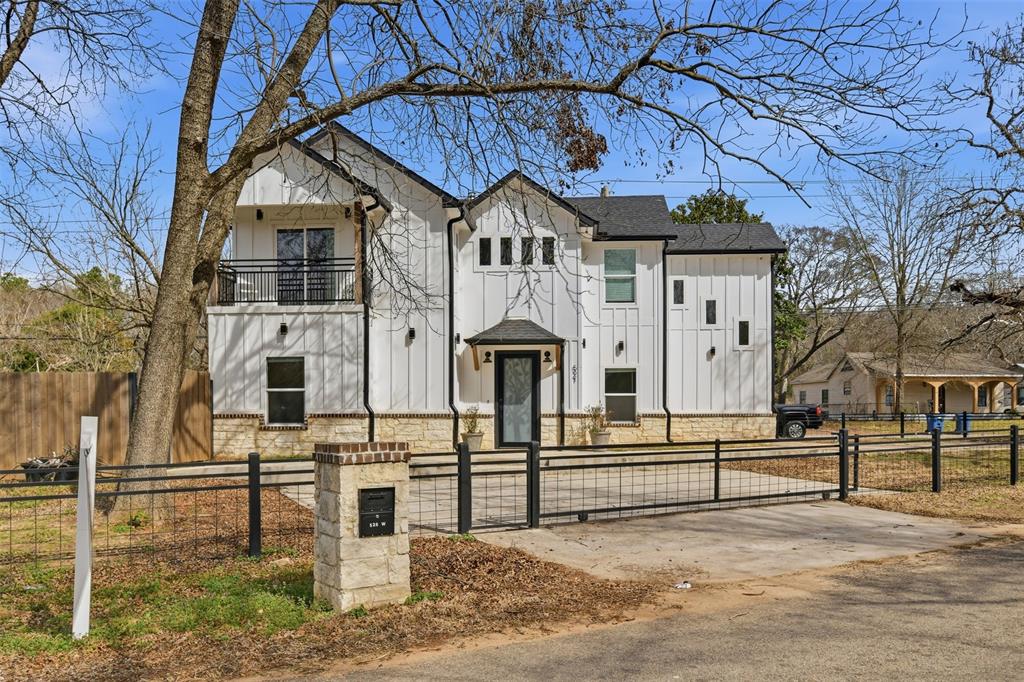 This charming two-story home built in 2022 offers modern, move-in-ready appeal. Boasting 4 bedrooms and 3 full bathrooms, it showcases a bright open-concept living area with abundant natural light and warm wood flooring. The stylish kitchen features a large island, built-in gas range, stainless-steel appliances, ample cabinet space, and an eat-in breakfast nook. Main living areas are accented with decorative lighting and quality woodwork, creating an inviting atmosphere. On the first floor, an additional bedroom and full bath provide versatile space. Upstairs, the private primary suite includes a double-vanity master bath and generous closet space for comfort. Outside, the low-maintenance yard and oversized driveway provide ample parking RV boat ready. There’s no HOA, and residents enjoy quick access to downtown Athens shops, dining, and community events. Top-rated Athens ISD schools Central Elementary, Athens Middle, and Athens High are nearby. Other highlights include abundant storage, a convenient upstairs laundry, and energy-efficient systems. Don’t miss the chance to own this beautifully finished home in a prime location schedule your private tour today!