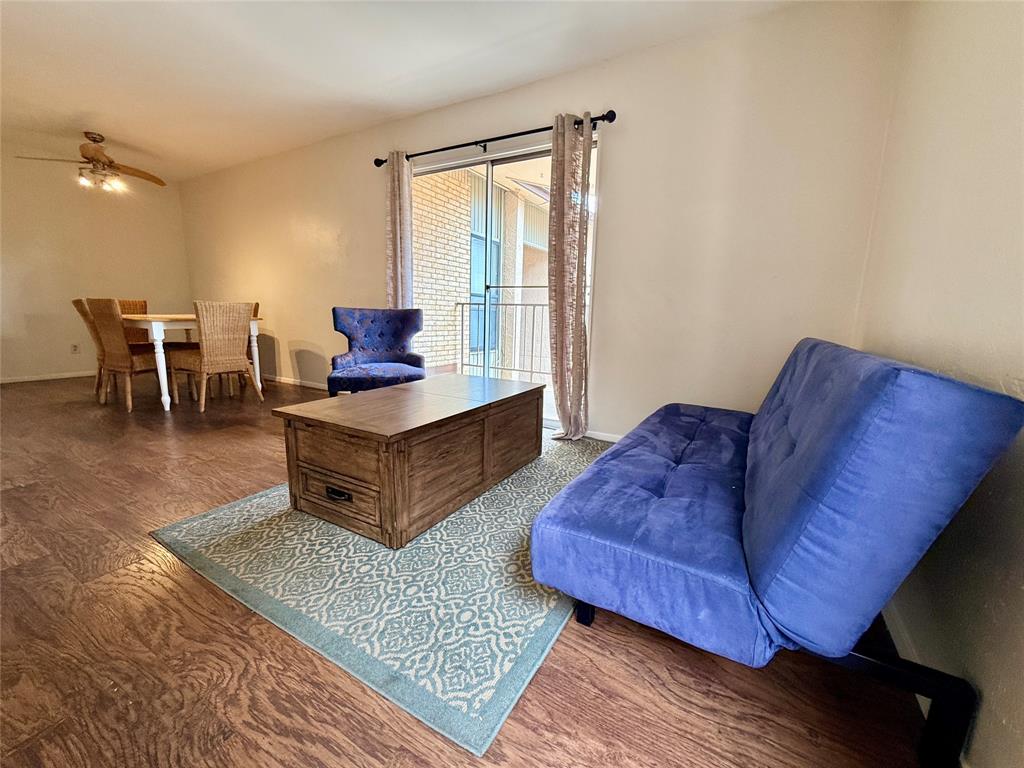 Nicely updated and one of the rare 1BR, 1.5 bath condos that feels like a townhouse.  Primary BR is upstairs from the main floor.  Condo is located located on 2nd floor with private balcony...granite counters, wood laminate, recent carpet, and tile floors.  Updated baths, recently painted, new lighting, and more.  Large master BR upstairs with huge walk-in closet and a 2nd closet with full bath. Ready for new owners to enjoy this condo, the awesome location, the outdoor covered patio and all the updates.  Quiet complex located on Midway Rd, convenient to 635 and I-35, and so convenient to shopping, etc.  Attractive condo complex, one assigned 'covered parking' and 2 community pools make this a great place to live.  Furniture and refrigerator are negotiable.  Will go fast, must see!