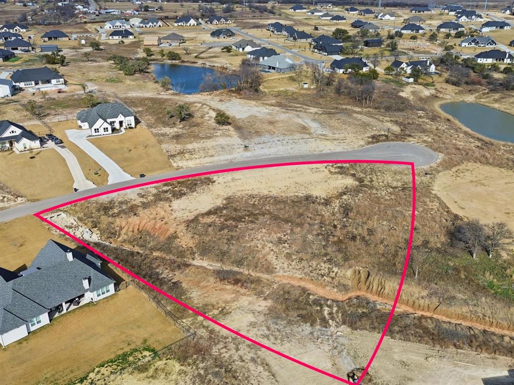 Build your custom home on this spacious and private homesite in the desirable Calhoun Acres community of Azle. This lot offers an excellent opportunity to create a custom residence with room to spread out, enjoy open skies, and take in breathtaking Texas sunset views. With no close neighbors, the setting provides a rare sense of privacy and peaceful living.



The property allows for a shop or workshop, making it ideal for those needing extra space for hobbies, storage, or equipment. Water and electric are readily available, and AT&T Fiber is in place, offering modern connectivity while preserving a quiet, country-style atmosphere.



With flexibility for a custom floor plan, outdoor living areas, and additional improvements, this lot is well-suited for those seeking space, freedom, and functionality. Conveniently located near Azle, Eagle Mountain Lake, and Fort Worth, Calhoun Acres offers a balance of rural tranquility and easy access to everyday amenities.