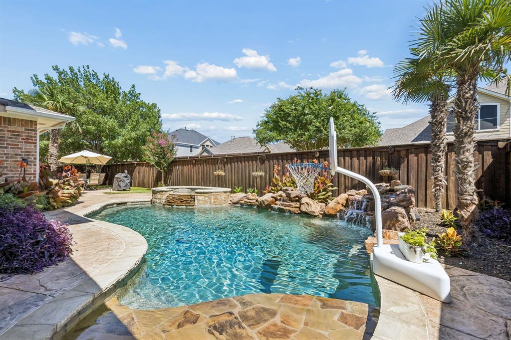 Welcome to this gorgeous home in the highly desirable Highland Village community! From the moment you step inside, you'll be captivated by the soaring ceilings and abundant natural light that create a warm and inviting atmosphere throughout. This spacious home features 4 bedrooms, a dedicated office, 3.5 bathrooms, and a game room, offering plenty of room for both everyday living and entertaining. Be sure to discover the hidden secret bonus room upstairs—a unique feature that adds extra flexibility and fun! The open-concept floor plan seamlessly connects the living room, dining area, and kitchen, making it ideal for gatherings of any size. The beautifully updated kitchen boasts modern appliances, ample cabinetry, and a large center island perfect for meal preparation and casual dining. Spacious living room with floor-to-ceiling stone fireplace. Retreat to the private primary suite, complete with a fully renovated spa-like bathroom featuring an oversized walk-in shower, soaking tub, and elegant finishes. Upstairs, spacious secondary bedrooms and versatile living spaces provide comfort and convenience for family and guests. Step outside to your own backyard oasis featuring a sparkling pool, relaxing spa, low-maintenance artificial grass and expansive flagstone patios—perfect for entertaining, outdoor dining, or simply unwinding after a long day. Ideally located near award-winning schools, premier shopping, dining, and parks, this exceptional home offers the perfect blend of luxury, comfort, and convenience.