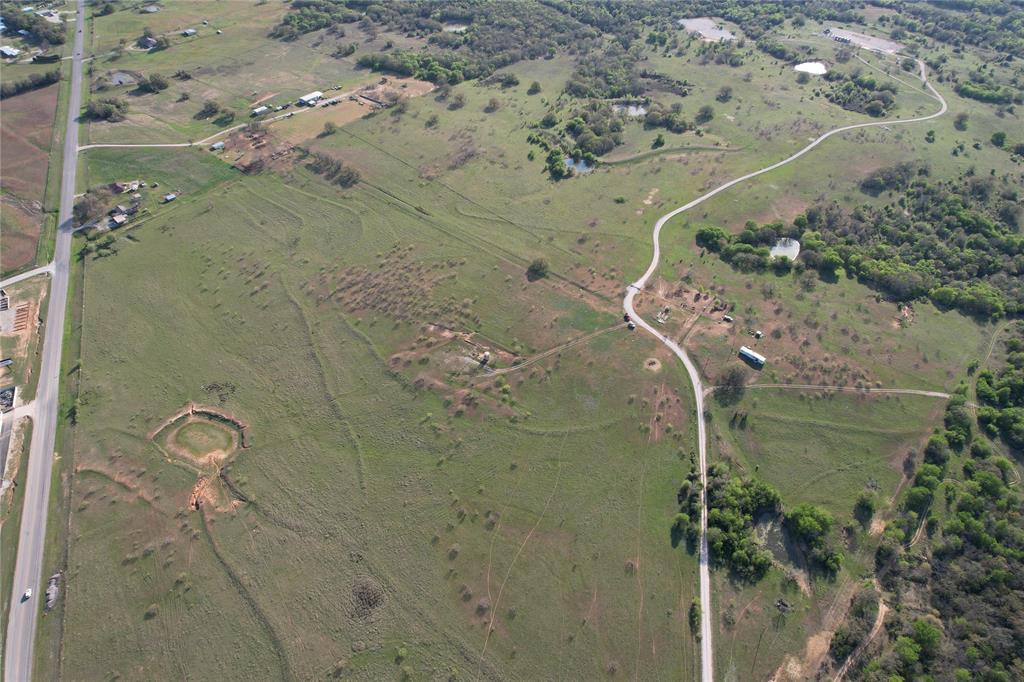 This expansive 183-acre property offers a unique opportunity for developers, investors, or those looking to build a private retreat, minutes from the thriving city of Decatur. The property features approximately 1,928 feet of prime road frontage along FM 51, providing easy access and excellent visibility. With diverse terrain, including open fields and scattered tree cover, the land presents numerous possibilities for residential, commercial development, agricultural use, or recreational purposes. The proximity to Decatur ensures convenient access to city amenities, schools, and services, yet remains a peaceful, rural setting.
This property is a rare find with endless potential, making it an excellent investment in one of North Texas's rapidly growing areas. Whether you're looking to create a residential community, start an agricultural operation, or simply enjoy the wide-open spaces, this land is a must-see.