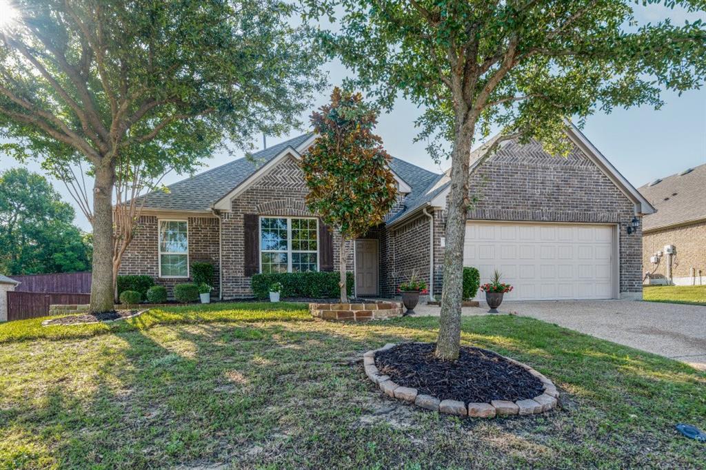 PRICE REDUCED. Your dream home is move in ready and waiting for you to call it your forever home.  This exquisite home sits on .28 acres with a very large back yard that can be used for building your designer pool or to enjoy with lots and lots of room.  The back yard is a blank slate that you can design into your own OASIS for sure.  The main floor has hardwood flooring in the living area, library, and foyer.  Carpeting in bedrooms, ceramic tile in bathrooms, kitchen, dining, mud room, utility room, kitchen office.  Carpeted stairway leading to an oversized Bonus or Game room upstairs where you can either play, watch movies, or sleep!  The primary suite is spacious with tons of natural light. Separated from the primary suite you will find two carpeted bedrooms that offer natural lighting as well.  Off of the living area step outside onto a beautiful covered painted brick patio with gas piping for your grill as well as a decorate ceiling fan.  You can rest, entertain or simply look onto the back yard which has a view of the beautifully built brick privacy wall with wooded area behind it...NO SRUCTURES... Roof is new with transferable warranty. The location of this home is so convenient with shopping just minutes away on both Virginia Blvd and University...Historical Downtown McKinney is no more than 5-8 minutes away as well.  Make this beautiful, well cared for home yours!