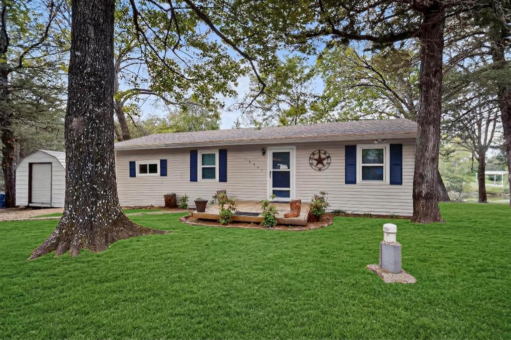 $5,000 BUYER INCENTIVE! Use it toward closing costs, a rate buy-down, or other allowable buyer expenses and make your move to the lake even easier.

Peaceful Waterfront Cottage – Move-In Ready Lake Life!

Welcome to your own slice of serenity on Lake Tawakoni, perfectly positioned on one of the area's most peaceful coves. This charming 2-bedroom, 2-bath waterfront cottage is truly turnkey—just pack your bags and start enjoying lake life from day one.

The property features a fully renovated pier and spacious boathouse, making it ideal for boating, fishing, kayaking, or simply relaxing by the water. Inside, the home is offered fully furnished, creating a seamless transition for a weekend retreat, full-time residence, or income-producing vacation rental.

Step outside to a fenced backyard that's perfect for pets and family gatherings, along with ample storage for all your lake toys, fishing gear, and outdoor equipment. The quiet, friendly waterfront community also offers a convenient boat ramp, providing easy access to all that Lake Tawakoni has to offer.

Whether you're enjoying sunrise coffee on the water, spending the day on the boat, or winding down with beautiful lake views in the evening, this property delivers the peaceful waterfront lifestyle you've been dreaming about.

Turnkey. Furnished. Waterfront. $5,000 Buyer Incentive.

Close today and start making lake memories tomorrow!
