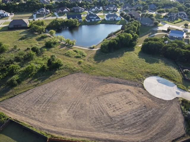 Rare 1-acre cul-de-sac lot in sought-after Sunnyvale, TX — ready to build your dream home! Builder of your choice. Enjoy stunning water views, mature trees, and natural privacy, with all utilities already in place (water, sewer & electricity). Lot is cleared and prepped for your builder with no delays. Located in top-rated Sunnyvale ISD, just minutes from Hwy 80 and East Dallas amenities. Large, move-in ready lots like this are increasingly scarce in the DFW market. Come walk the land and imagine the possibilities!