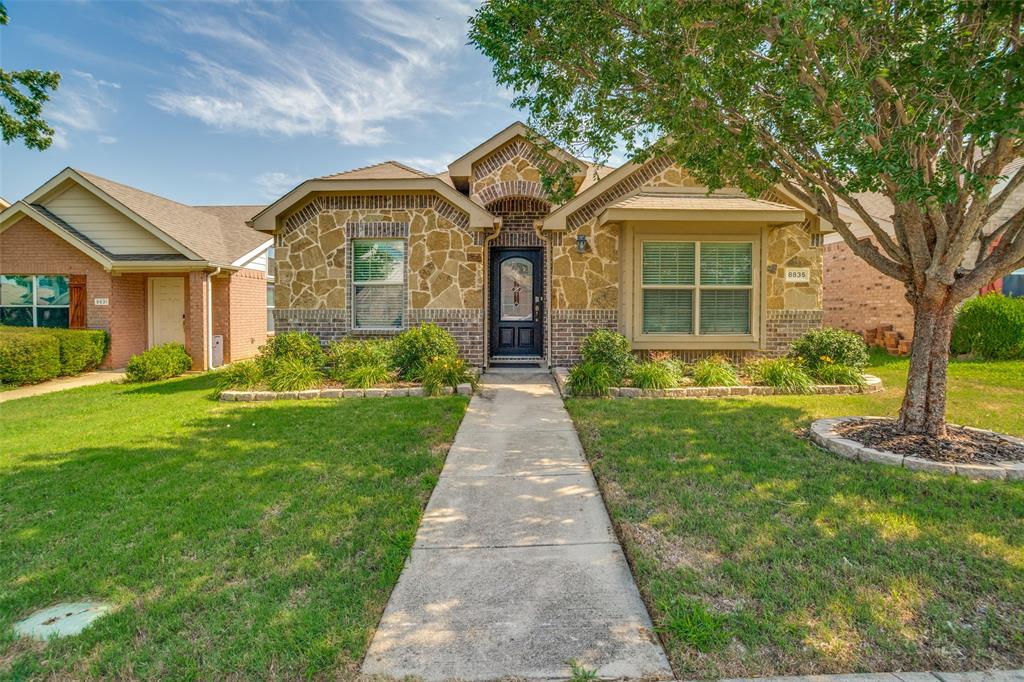 Welcome to 8835 Tucker Street in the desirable Cross Oak Ranch community, where comfort, style, and convenience come together to create a place you'll be proud to call home.

From the moment you arrive, the home's inviting curb appeal sets the stage for what awaits inside. Step through the door to discover an open floorplan enhanced by engineered hardwood flooring throughout the main living area and an abundance of windows that fill the home with natural light.

The spacious kitchen and living areas flow seamlessly together, creating a welcoming environment for everyday living and entertaining alike. The eat in kitchen offers plenty of space for casual meals, morning coffee, or gathering with guests while maintaining a natural connection to the heart of the home.

With four bedrooms and two bathrooms, the layout provides flexibility for a variety of needs. The private primary suite offers a comfortable retreat, while the secondary bedrooms can accommodate guests, hobbies, workspaces, or additional living arrangements.

Adding to the home's move in ready appeal, the washer, dryer, refrigerator, lawn equipment, and a nearly new bedroom set consisting of a bed and nightstand are included with an acceptable offer, allowing the next owner to settle in with ease.

Beyond the home itself, Cross Oak Ranch offers an exceptional community experience with neighborhood pools, parks, playgrounds, green spaces, and community gathering areas. Residents enjoy convenient access to nearby shopping, dining, and everyday services, while Lake Lewisville is just minutes away for recreation and waterfront enjoyment.

Whether you're looking for a move in ready home, an open and functional layout, or a community rich with amenities, 8835 Tucker Street delivers the perfect blend of comfort, convenience, and lifestyle in one of Cross Roads' most popular neighborhoods.