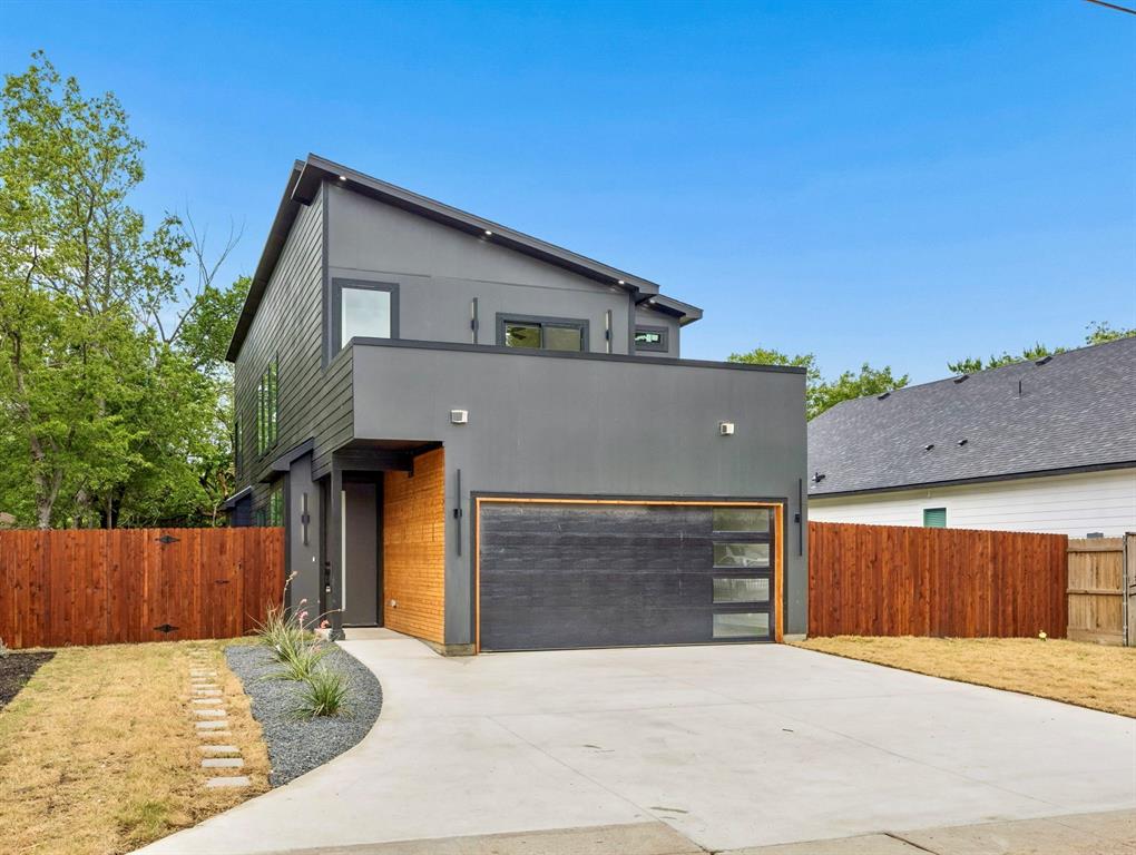 Step into modern luxury with this stunning contemporary home designed for both everyday living and effortless entertaining. Featuring an open-concept floor plan filled with natural light, this beautifully crafted residence seamlessly blends sophisticated design with functional spaces.
From the moment you enter, you’re welcomed by sleek finishes, beautiful tile work throughout, and a striking modern fireplace that anchors the main living area with warmth and style. The chef-inspired kitchen flows perfectly into the living and dining spaces, complete with a large walk-in pantry and an eye-catching glass wine display that adds a touch of elegance and sophistication.
Offering 4 spacious bedrooms and 3.5 baths, this home provides the perfect layout for families or those who love hosting guests. Two private balconies extend off separate bedrooms, creating peaceful retreats to enjoy your morning coffee or unwind in the evenings.
Additional highlights include a functional mud room designed to keep daily life organized and thoughtfully designed spaces that combine luxury with practicality.
With upscale finishes, contemporary architecture, and designer details throughout, this home delivers the perfect blend of comfort, style, and modern living.