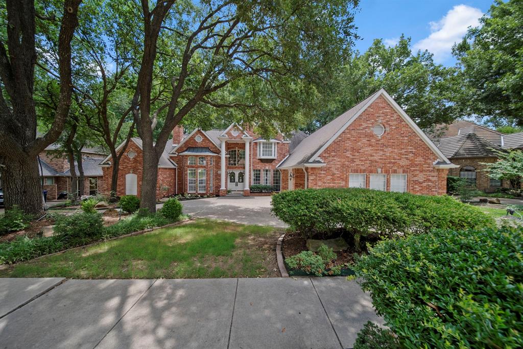 Rare opportunity on prestigious Woods Lane in the highly sought-after Spring Park community. Backing to a scenic creek and surrounded by mature trees, this home offers a private setting in one of the area's most desirable neighborhoods. Residents enjoy an unmatched lifestyle with miles of walking and biking trails, a private lake, tennis courts, clubhouse, community pool, and numerous neighborhood amenities.
Designed for both everyday living and entertaining, this home features an open floor plan with real hardwood floors, plantation shutters, custom Lutron electric shades, gas fireplaces, a built-in surround sound system, three hard wired nest cameras and security system. The chef's kitchen is equipped with premium Dacor appliances, a Sub-Zero refrigerator, double pantry, and abundant storage.
The spacious primary suite includes a cedar-lined closet, while thoughtful features throughout the home include a convenient laundry chute, central vacuum system, water softening system, and a wet bar with wine refrigerator. A three-car garage provides ample space for vehicles, storage, and hobbies with an EV charging station. 
Step outside to your private backyard retreat overlooking the creek, complete with a heated pool and spa, stone fire pit, cedar herb planters, playground with new soft mulch, and multiple spaces to relax or entertain year-round.
Combining exceptional amenities, quality upgrades, and a premier location within Spring Park, this home offers the perfect balance of privacy, comfort, and outdoor living.