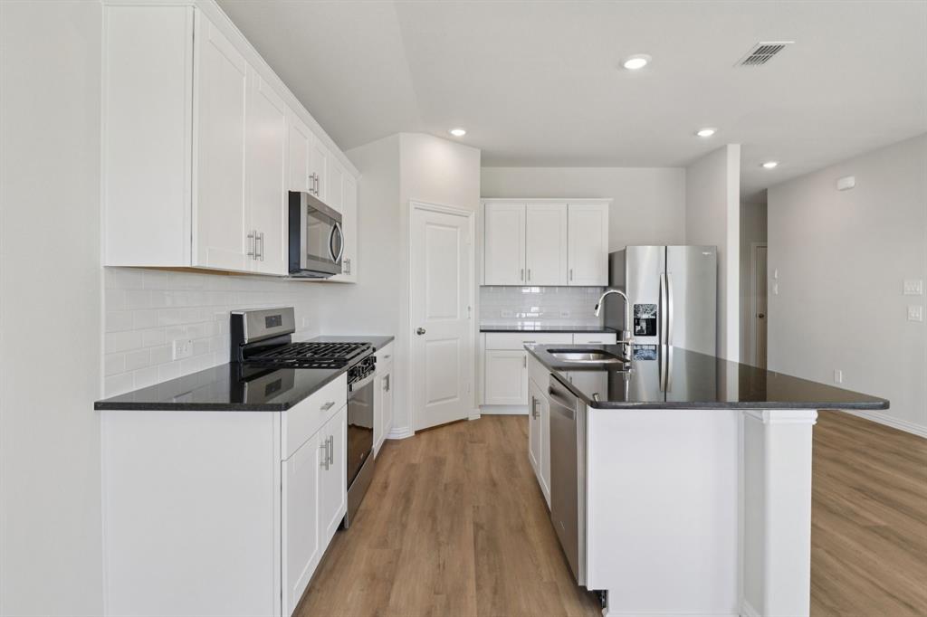 BRAND NEW energy - efficient home May 2026! Fix dinner at the Greenville's sprawling kitchen island without missing any of the action in the family room. White cabinets with black pearl granite countertops, tan tone EVP flooring with taupe carpet. Situated perfectly in a small town, Stonehaven homeowners will enjoy the benefits of an effortless commute to Dallas using nearby I-20 and Highway 175. This serene community also boasts amenities including a resort-style pool, kid's splash pad, cabanas, and a children's playground. Schedule a tour and see our energy-efficient features like multispeed HVAC systems, spray foam insulation, and high-performance air filtration.* Each of our homes is built with innovative, energy-efficient features designed to help you enjoy more savings, better health, real comfort and peace of mind.