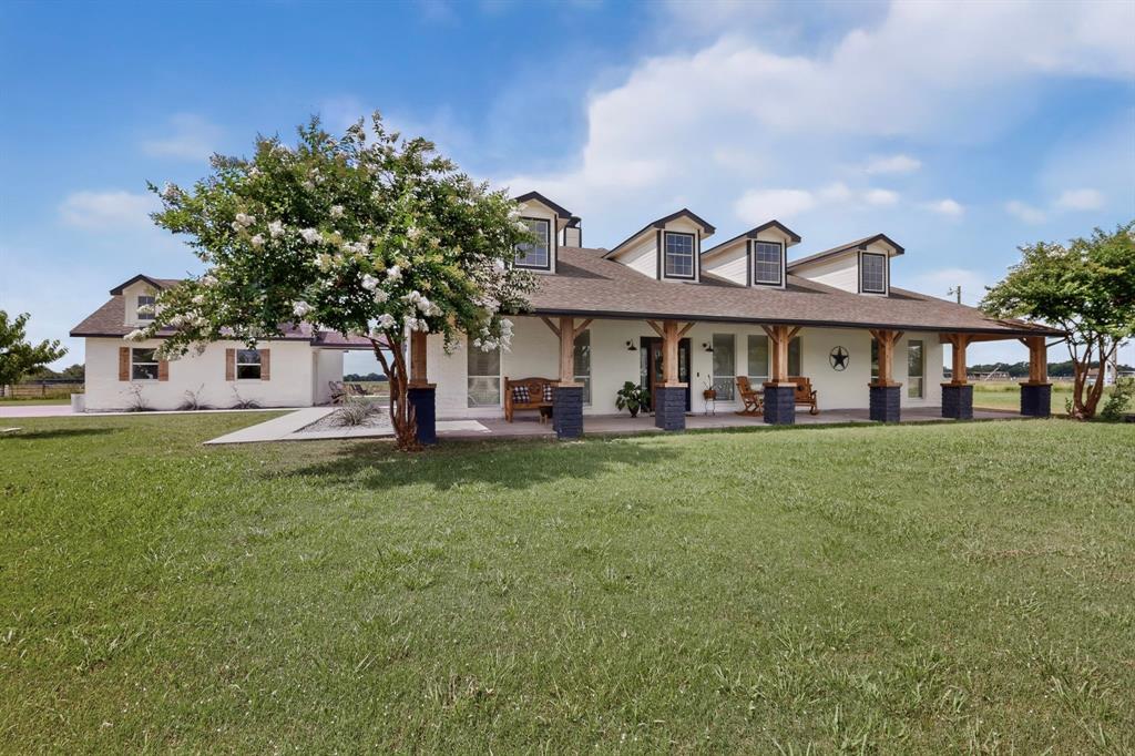 Welcome to your private country retreat in Caddo Mills! Situated on 10 beautiful acres, this charming 3-bedroom, 2-bath home offers comfortable living space, modern updates, and the peaceful lifestyle you've been dreaming of.
Step inside to discover soaring vaulted ceilings, abundant natural light, and an inviting open-concept floor plan designed for both everyday living and entertaining. The spacious living room flows seamlessly into the dining area and kitchen, where you'll find granite countertops, white cabinetry, a breakfast bar, and stunning wood-plank ceiling accents that add warmth and character.
Both bathrooms have been beautifully remodeled with stylish finishes, creating a fresh and modern feel throughout the home. The thoughtful layout provides comfortable living spaces while maintaining a welcoming atmosphere.
Outside, enjoy the expansive covered front porch overlooking the scenic acreage and surrounding countryside. A picturesque pond near the entrance creates a welcoming first impression, while the detached 2-car garage provides additional storage and workspace.
This versatile property is fenced and cross-fenced, making it ideal for horses, livestock, and agricultural use. With no HOA restrictions you'll have the freedom and flexibility to enjoy country living your way. Whether you're looking for a horse property, hobby farm, homestead, or simply a private retreat with room to roam, this property offers endless possibilities.
Conveniently located in Caddo Mills, you'll enjoy the tranquility of rural living while remaining within easy reach of schools, shopping, dining, and major highways. Don't miss this rare opportunity to own a beautifully updated home on 10 acres with a pond, detached garage, agricultural exemption, and plenty of room to grow.