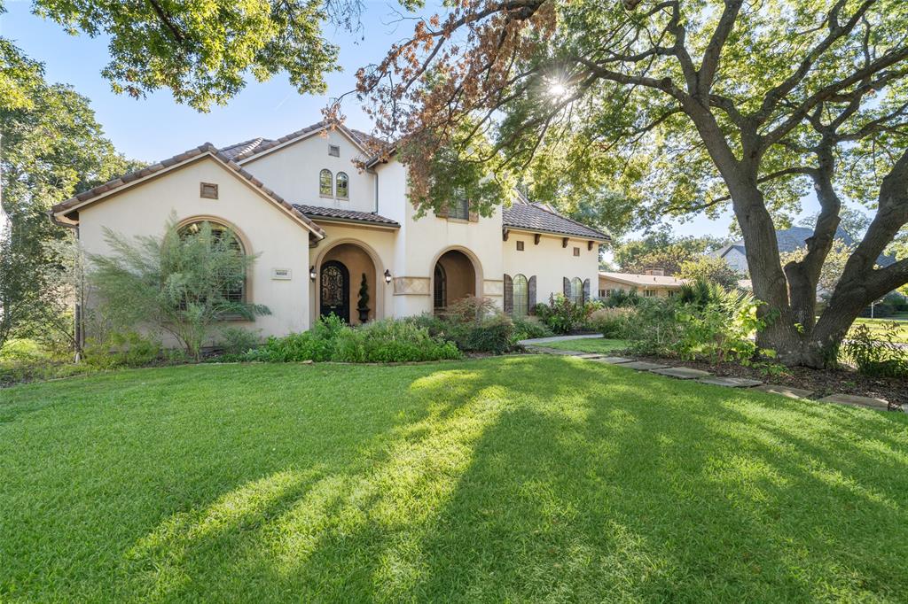 Step into opulence in this 5,600+ sqft masterpiece, ft 5 bdrms, all w ensuites, & a host of lavish amenities. Handscraped hardwood, plantation shutters, & wrought iron front door welcome you w elegance. True gourmet kitchen boasts 6-burner gas cooktop w griddle, built-in refrigerator, & dishwasher - all 3 Thermador brand - along w oversized pantry & dedicated wine storage. Each bedroom offers privacy w its ensuite, the primary ensuite ft jetted tub, separate shower, dual sinks, & vanity space. Whole-house vacuum system adds convenience to daily life, & upstairs find spacious media rm w 5.1 surround sound & bonus game rm w wet bar for endless entertainment. 3 fireplaces & a built in grill create cozy space for gathering outdoors, complete w mosquito sprayer system to ensure bug-free evenings. This home is a testament to the art of living well, from the grand entrance to impeccable design & lavish amenities, offering a lifestyle that's nothing short of extraordinary.
