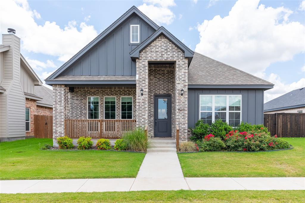 Welcome to this beautifully crafted custom home by Skytop Homes LLC, nestled in the highly desirable Legacy Township community. Residents enjoy exceptional neighborhood amenities, including a clubhouse, community park, and sparkling inground pool, creating the perfect blend of comfort and convenience. Offering 1,930 square feet of thoughtfully designed living space, this home showcases an open concept floor plan ideal for both everyday living and entertaining. The inviting living area features a cozy wood burning fireplace and flows seamlessly into the kitchen, complete with a large island, breakfast bar, soft close cabinetry, walk in pantry, and stylish finishes throughout. The spacious primary suite provides a private escape with direct access to the covered patio and backyard. The spa inspired en suite bath offers dual vanities, a soaking tub, a tiled walk in shower, and an oversized walk in closet. Beautiful wood look ceramic tile runs throughout the main living areas, while the bathrooms feature tile flooring and the bedrooms offer soft carpeting for added comfort. Additional highlights include recessed lighting, a convenient mud area, covered front and back porches, and a rear entry garage. Outside, you'll find a fenced backyard, lush sod, and a sprinkler system, creating a move in ready outdoor space perfect for relaxing or entertaining. Combining quality craftsmanship, modern amenities, and timeless style, this home is ready for its next owner to enjoy.