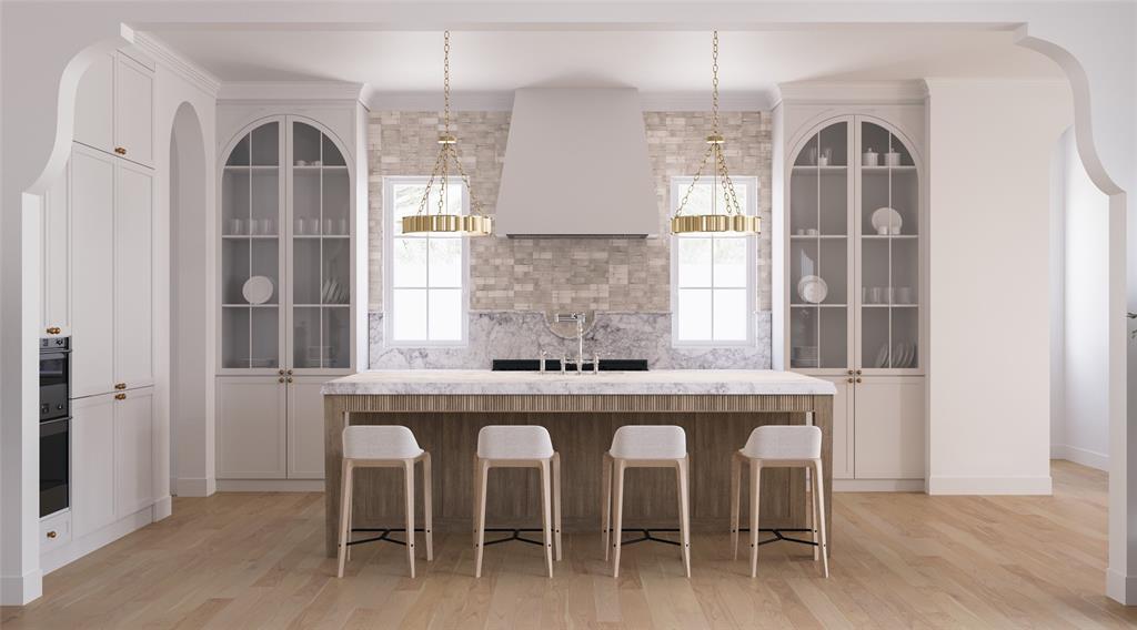 Exclusively designed and built by Jessica Koltun Home, this residence exemplifies architectural elegance and refined modern living in one of Dallas’ most sought-after neighborhoods. Spanning 5,406 square feet, it’s thoughtfully curated with every element tailored for both style and functionality.

The timeless façade, defined by light brick, arched entryways, and classic symmetry, sets the tone for the sophisticated interiors within. Inside, soaring ceilings, expansive windows, and an open-concept layout create a light-filled environment perfect for everyday living and entertaining.

Featuring 5 bedrooms, 6 baths, and multiple flexible living areas, the design emphasizes flow and livability. A first-floor primary suite offers a tranquil retreat with a spa-inspired bath and dual closets, while the chef’s kitchen showcases designer appliances, custom millwork, and seamless connectivity to the family and dining spaces.

Blending enduring design with modern comfort, this home is a true expression of Jessica Koltun Homes signature aesthetic—timeless, tailored, and undeniably sophisticated.