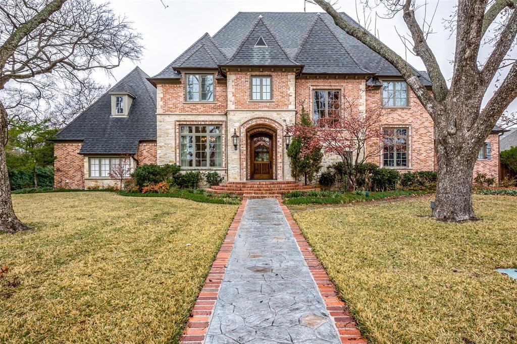Former builder’s personal home with a rare furnished full basement located on a corner lot.  This home is an entertainment experience.  Exquisitely paneled library with fireplace & private side entry.  Den with French doors, fireplace, & lagoon pool views.  Chef’s kitchen overlooking the charming breakfast room with churchlike ceiling & fireplace.  Master down, three bedrooms up, plus a game room & a bonus room.  The basement features a 2nd game room with pool & shuffleboard tables, a wine storage & dining area, an equipped fitness room, a tiered media room, a full bath, & a safe area with one-foot-thick walls.  Also, this home is built like a fortress and has a home generator.