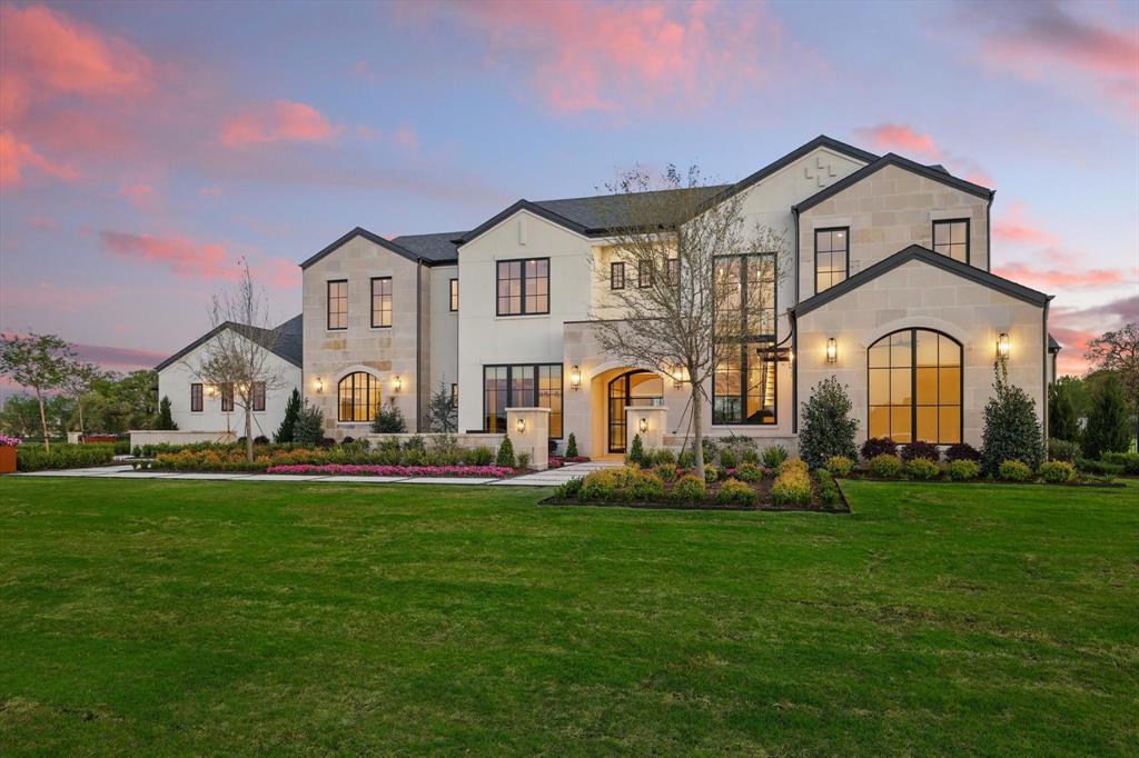 Modern Luxury Estate in Argyle on 2 Acres

Step into modern sophistication with this brand-new 6,900 sq ft architectural masterpiece by Denton Creek Builders located in the highly sought-after Argyle ISD. Nestled on 2 sprawling acres, this estate blends elegance and functionality, designed for luxury living and refined entertaining.

As summer breathes life into North Texas, enjoy blooming views from the stunning interior glass-wall study or relax in your resort-style backyard featuring a newly added custom pool, designer landscaping, and contemporary fountains creating the ultimate private retreat.

The home boasts 5 spacious bedrooms and 5 full baths, complemented by 2 elegant powder rooms. Dual staircases frame the expansive entry, leading to a stunning upstairs game room with built-in bar, cozy playroom, and balcony perfect for watching unforgettable Texas sunsets. Downstairs, the open-concept layout flows through a chef's kitchen, wine room, and light-filled living areas with floor-to-ceiling windows.

Host summer gatherings under the outdoor kitchen with patio fireplace and retractable screens while overlooking the spectacular pool and outdoor living spaces designed for year-round enjoyment. This one-of-a-kind estate offers the perfect blend of modern luxury, comfort, and resort-style living in the heart of Argyle.