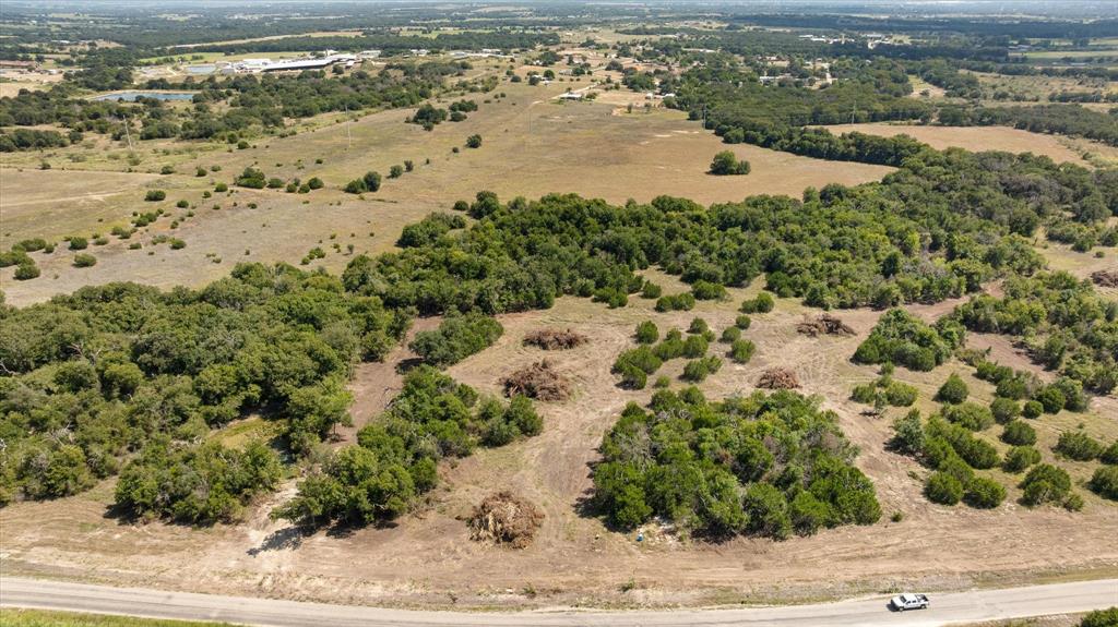 Tract 2 is 2.002 acres. Power is being brought along County Road for future access as an included feature. All Lots are 2-3 acres Tracts. Great Location on Paved Road outside City Limits. This is a great opportunity to Build your perfect Dream Home in a great area just outside of town. Additional Lot MLS 21060332, 21060626, 21060753, 21060726, 21060730, 2106043, 21060446,21060764, 21060786 Buyer will be required to get a new Survey