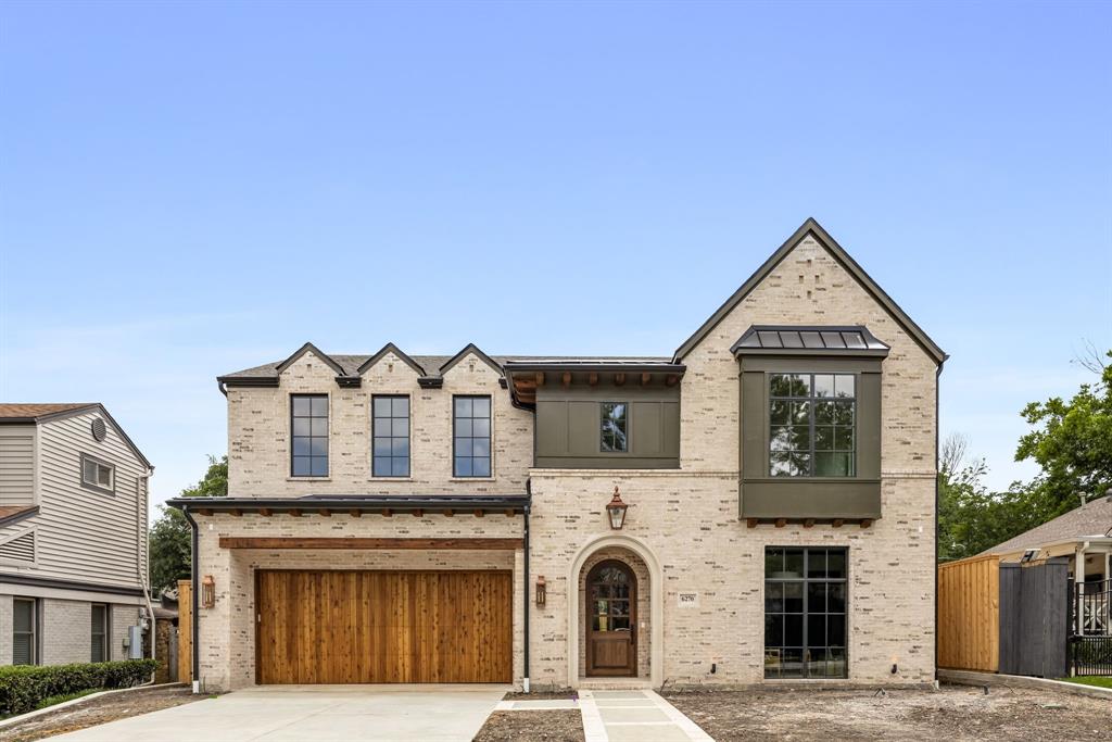 Stunning custom home expertly crafted by Fairmont Homes, perfectly positioned in one of Lakewood’s most desirable pockets within walking distance to Lakewood’s premier amenities, White Rock Lake, & St. Thomas Aquinas. Blending timeless architecture with thoughtfully curated designer finishes, this exceptional residence delivers a level of craftsmanship rarely found in today’s market.The exterior showcases natural brick detailing, copper lanterns, & rich architectural character that create an established, enduring presence from the moment you arrive. Inside, luxurious finishes abound, including white oak hardwoods, smooth-finish walls, designer lighting, custom millwork, & rare quartzite & marble surfaces thoughtfully layered throughout. At the heart of the residence is the remarkable chef’s kitchen, featuring integrated panel-front GE Monogram appliances, custom inset cabinetry, oversized island, & an expansive working pantry that offers both beauty & functionality. Designed with effortless entertaining in mind, the open-concept layout allows the kitchen to seamlessly flow into the dining & family rooms, all overlooking the stunning resort-style backyard. The spacious family room is anchored by a striking center fireplace & expansive Pella sliding doors that create true indoor-outdoor living. Step outside to the covered loggia complete with a fireplace, outdoor kitchen, sparkling pool, & large turf yard. A sophisticated wet bar just off the living room further enhances the home’s entertaining capabilities. The luxurious downstairs primary suite offers vaulted ceilings, serene pool views, a spa-inspired marble bath, oversized walk-in closet, & a dedicated en-suite laundry. The main level also features an incredible paneled study, designer powder bath with plaster-finished walls, & mudroom. Upstairs, three spacious secondary bedrooms each feature en-suite baths and walk-in closets, accompanied by a huge game room with custom built-ins & the main laundry room.
