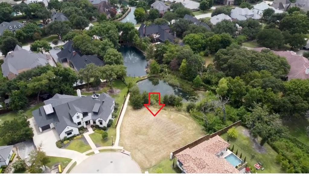 Grab the final opportunity for an exceptional fusion of luxury living, privacy, and breathtaking surroundings on a Cul-De-Sac. Build your custom home in the upscale community of Carmel Place Estates, in the heart of Colleyville, already home to multi-million dollar residences. The community is located in the Grapevine-Colleyville ISD. Slightly over Half-acre residential lot with breathtaking water views. Conveniently located just minutes from shopping, dining, and entertainment, with quick access to DFW Airport. Within a short distance are Sparger Park an 8 acres with playgrounds, trails, and pavilion, as well as, Colleyville's City Park-40 acres with an amphitheater, sports fields, trails, and a pond. Carmel Place Estates is located just off Texas State Highway 26, connecting it to other cities in Tarrant County and the larger transportation network of the region. Dallas Fort Worth International Airport is at a short distance from the location.