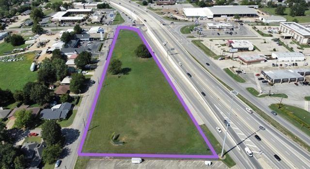 Prime commercial property on Loop access rd between Lamar Ave and Pine Mill Rd. Frontage on Pine Mill and 35th NE. Possibilities for commercial or retail strip center, and more. South boundary is 10 ft from church concrete parking lot. Note that there is a portion to the S end of the property currently zones for single family but with high probability of being rezoned. August 2022:  TXDOT revealed plans to remove retainer wall on the property's east side and grade to the access road which should improve visibility and access!  Should be verified with TXDOT.