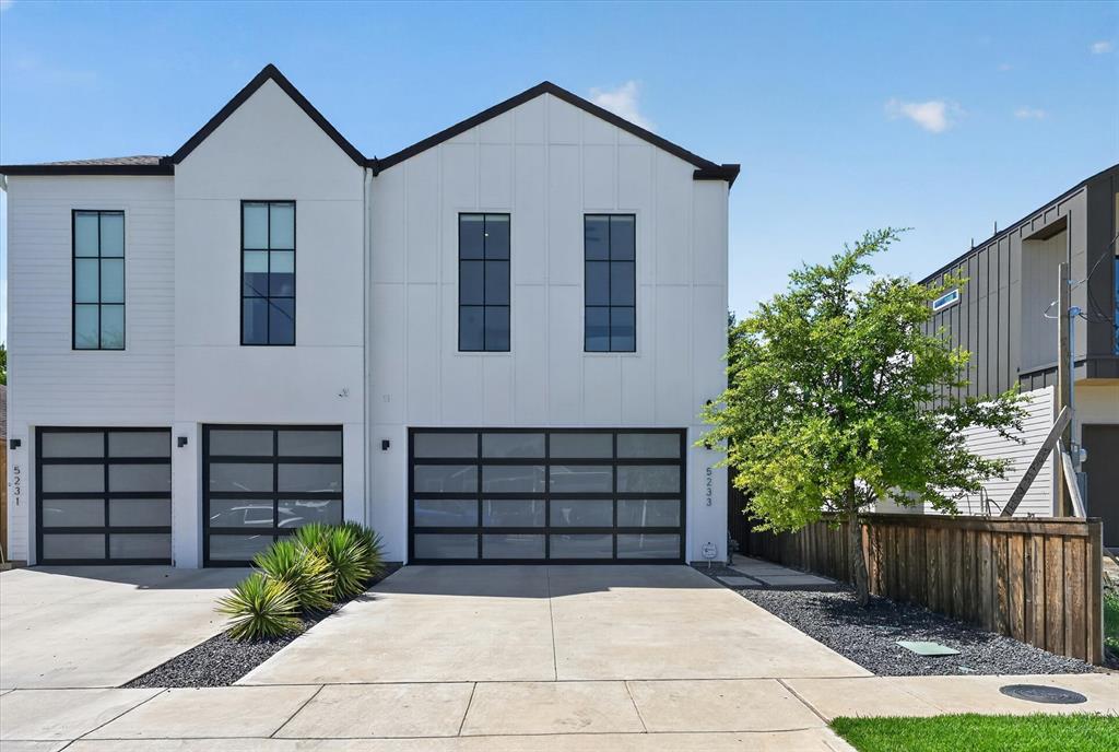 MOTIVATED SELLER MOVING OUT OF STATE! Conrad-built home is only a few years old and comes move-in ready with $25k of upgrades! Clean Modern Farmhouse design with an open-concept floor plan, it features low maintenance stained concrete floors throughout the first level.Chef's kitchen is designed for ease of cooking and entertaining, with abundant prep space, stainless steel appliances including a refrigerator, and a walk-in 'Costco-Ready' pantry; soft close drawers & cabinets as well!The kitchen flows seamlessly into the dining and living areas where large sliding glass doors open to a covered patio and a perfectly sized backyard, surrounded by an 8ft. board on board privacy fence and beautiful mature trees.The Seller is leaving a professionally installed four-person sauna - the perfect place to unwind after a long day! Upstairs cozy carpeting adds warmth to the bedrooms while hardwoods line the hallway. Custom window coverings remain!  The spacious primary suite offers two oversized walk-in closets and a luxurious ensuite bath with dual sinks, a soaking tub and a separate shower.Two additional light-filled, generously sized bedrooms share a full bath. The conveniently located laundry room on the bedroom level has lots of cabinets for storage, and the washer and dryer remain.  Additional highlights include high-efficiency 100% foam insulation, and a whole-home water filtration, softening, and reverse osmosis system that the Seller is leaving. Ecobee 3 zone HVAC, washer-dryer, garage door, oven, as well as the whole home security system & Ring doorbell(remains) are all WIFI enabled. Located in the rapidly growing Mount Auburn neighborhood, this home is just minutes from downtown Dallas, Lakewood, Deep Ellum, and Lower Greenville, making shops, entertainment, and restaurants within easy reach!Steps from your front door, is the Santa Fe Trail, perfect for your daily exercise or a bike ride to White Rock Lake!Exceptional move-in and live-in ready home at a great price!