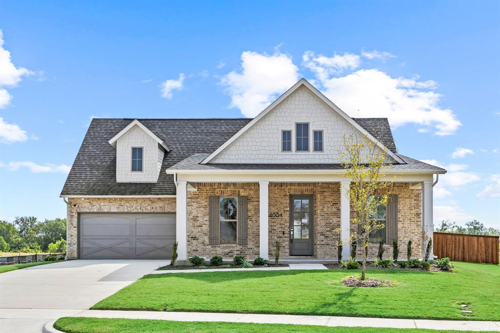 Looking for a garage deep enough to fit your truck? You've found it...this garage is 25ft deep! The home sits on an oversized lot with expansive backyard. Charming front porch welcomes you into this gorgeous 1 story open floorplan with tons of natural light. Wood flooring throughout. Family room features tall ceilings, large windows and beautiful centered fireplace. Design kitchen with amazing cabinetry and large island overlooks family room and dining room overlooking backyard. Private luxurious oversized primary suite with spa-like bath. Private secondary bedrooms and bath located on opposite side of home. Powder bathroom located at front of home perfect for guests. Quiet study nestled at the front of the home with beautiful natural light.