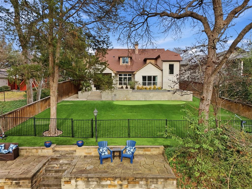 Situated in the heart of Dallas, yet worlds away from the everyday, this extraordinary Lakewood residence rests on the banks of the Williamson Branch, offering a refined balance of luxury, everyday comfort, and effortless indoor-outdoor living. Sophisticated yet designed for real life, the home is distinguished by clean lines, contemporary style, exquisitely crafted elements, and an awe-inspiring palette of soft colors and purposeful design.
 
A thoughtfully curated layout offers two inviting living areas, a state-of-the-art kitchen, dining room, four bedrooms, and an oversized primary closet, along with an exceptional outdoor kitchen and living space.
 
Step into an entirely new world in the backyard oasis. Designed for true outdoor living, the expansive retreat features a large, covered living area, outdoor kitchen with built-in grill, sparkling pool and spa, low-maintenance artificial turf yard with putting green, and direct access to the Williamson Branch. This is how you live—and flourish—at home.