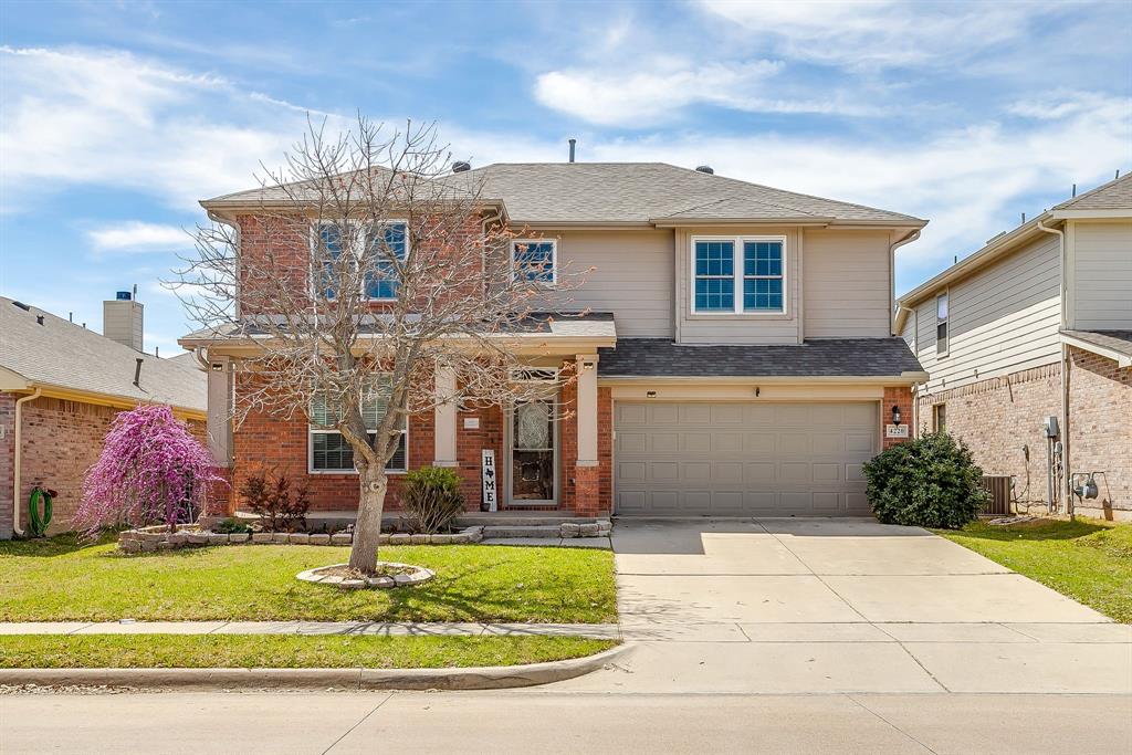 Welcome to 4220 Highgate Road, a beautifully maintained two-story home that provides everyday comfort and all the space you need. Boasting fantastic curb appeal with a classic brick and siding exterior, a welcoming covered front porch, and mature landscaping, this property is ready to impress from the moment you arrive.  Step inside to discover a bright, open-concept floor plan highlighted by gorgeous wood-look flooring and abundant natural light. The inviting entryway flows seamlessly into a versatile formal dining or flex space, perfect for hosting gatherings. At the heart of the home is a spacious, well-appointed kitchen featuring rich, dark wood cabinetry, stainless steel appliances, and an oversized island with seating. The kitchen opens directly into a cozy breakfast nook and a spectacular living room, anchored by a beautiful white brick fireplace and elevated by dramatic vaulted ceilings.
Retreat to the generously sized primary suite, complete with warm wood-look floors and large windows. Upstairs, you will find a massive game room or second living area with an attached full bathroom, offering endless possibilities for a playroom, media center, or guest suite.
Outdoor entertaining is a breeze! The home features a large covered back patio equipped with dual ceiling fans, providing the ultimate shaded retreat for summer barbecues or relaxing evenings. The fully fenced backyard also includes a convenient storage shed and plenty of green space.