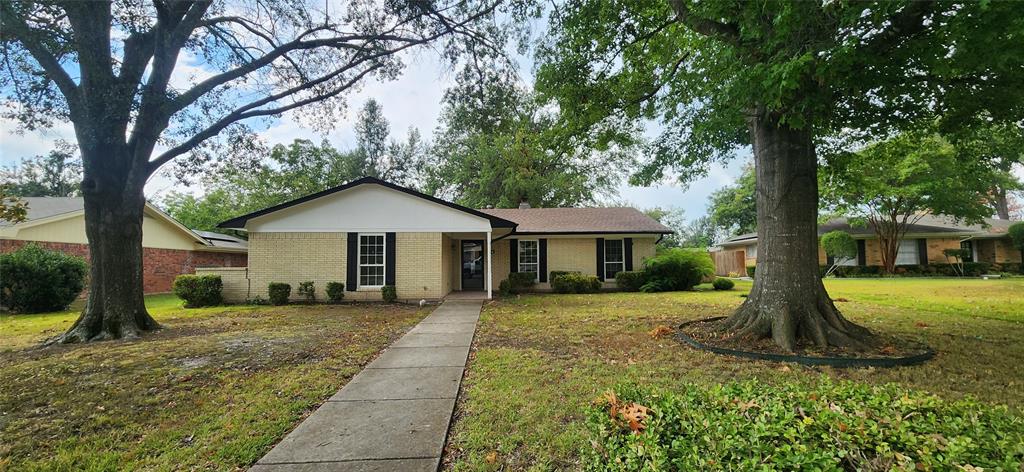 Welcome to this beautifully updated 3-bedroom, 2-bath brick home full of Texas charm. Nestled on a spacious lot with mature trees, this property offers an oversized backyard perfect for entertaining, gardening, or simply enjoying the outdoors. Inside, you’ll find a bright and inviting layout featuring newly installed luxury vinyl plank flooring, modern granite countertops, and fresh finishes throughout. The kitchen offers plenty of cabinet space and flows seamlessly into the dining and living areas. A cozy fireplace creates a warm and welcoming focal point for family gatherings. The primary suite boasts a large bedroom, walk-in closet, and private bath. Conveniently located in a well-established neighborhood close to schools, shopping, and dining, this home is move-in ready and waiting for you!