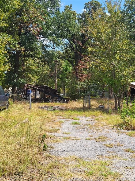 Shade Trees, open drive, space to relax and expand.  Improved areas, wood carport and approved for manufactured home or build.  There is partial sides sand back fencing on these double lots.  A  Resort Property with RV Hook ups and boat area.  Log Cabin has community sewer and water, variety of amenities and common areas, boat launch, picnic areas.  Near Malakoff, Highway access to Hwy 175 or Hwy 31 East and West.  Variety of restaurants,  Malakoff ISD, Senior Center and Skate Park at Hwy 198.
Good fishing at Cedar Creek Lake, sport lake with playgrounds.  Visit Log Cabin website for restrictions and information.  Come visit lake area and see the possibilities.  Negotiable owners.