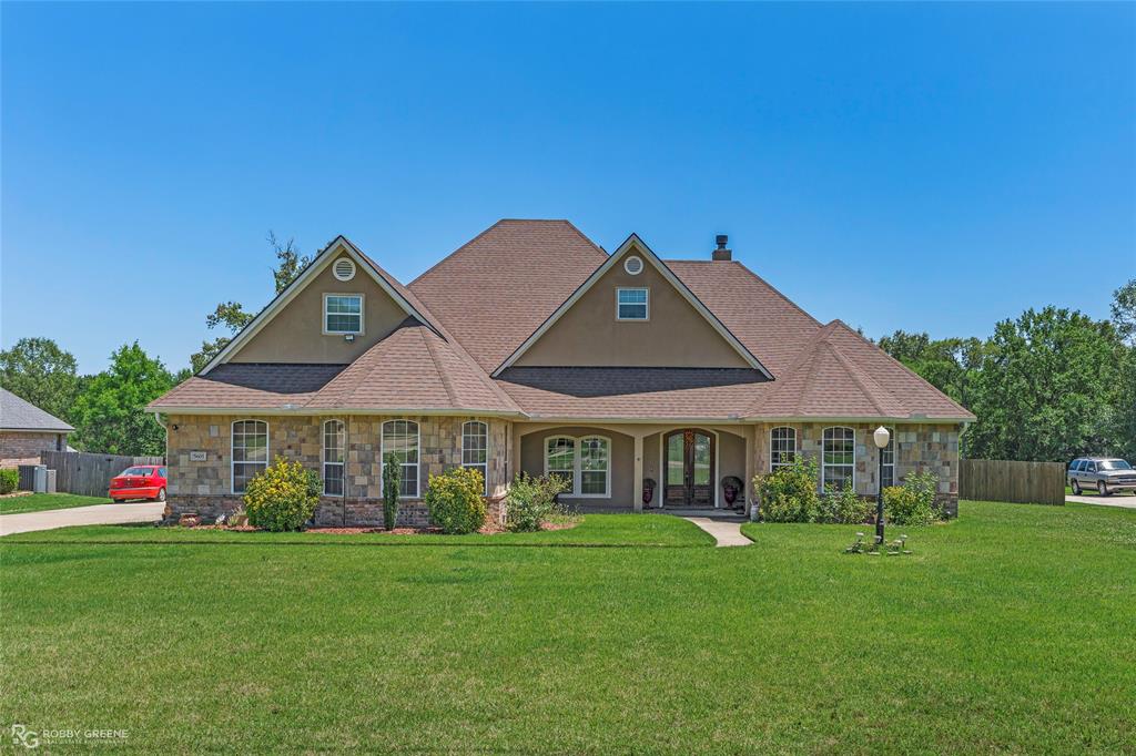 An incredible backyard meets a stunning home in this 4-bedroom, 3.5-bathroom property nestled on just over an acre. The front facade features a gorgeous blend of stone, brick and stucco that create a timeless look while the professional landscaping gives immediate curb appeal. The massive backyard includes an above ground pool with decking to enjoy the summer sun, while no backyard neighbors allows you both privacy and quiet time outdoors. Plus, there's still room if you decide to add a garden or install a firepit area - the flexibility to make this your own oasis is sure to impress! Inside, the high ceilings and abundant natural light give the open floorplan a light and airy feel. The spacious living room features French doors that lead to the back patio as well as a cozy fireplace to enjoy time inside. The modern kitchen includes stainless appliances, granite counters, and a center island, and with both a breakfast nook and formal dining room, you have options for entertaining. The relaxing primary suite includes room for a sitting area, access to the backyard, and a spa-like ensuite bath complete with dual vanities and tiled walk-in shower. The three additional bedrooms offer plenty of room for guests, family, or even a home office. Ceramic tile and wood flooring throughout the home offer easy maintenance without sacrificing style. This property is sure to be at the top of your list with all the unique features it has to offer. Don't wait, schedule your private tour today!